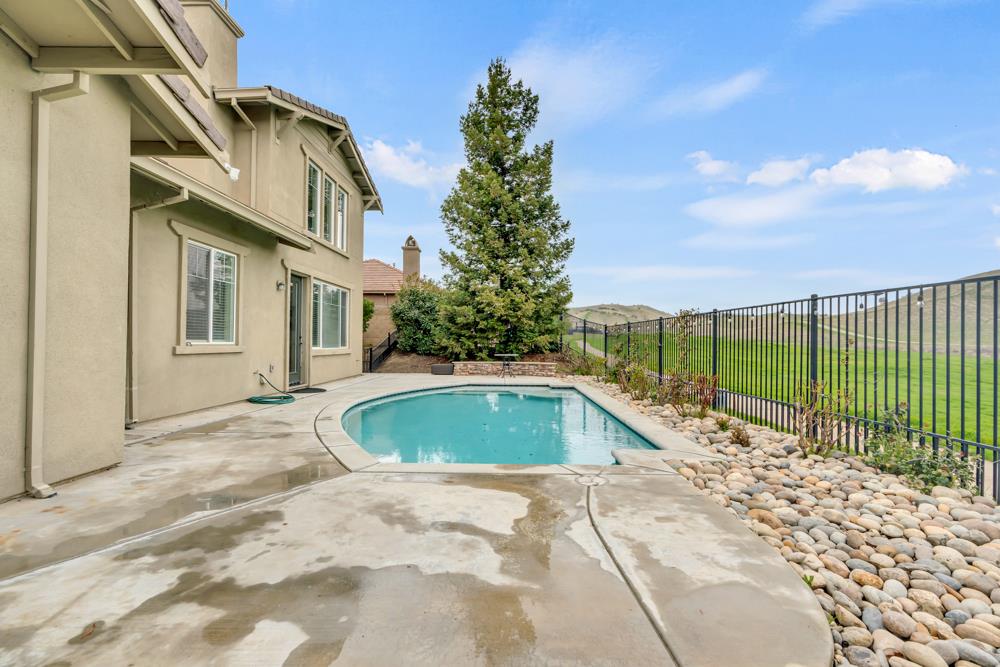 20300 Panoz Road Patterson, CA 95363 - Photo 50 of 61 a view of outdoor space pool patio and entertaining space