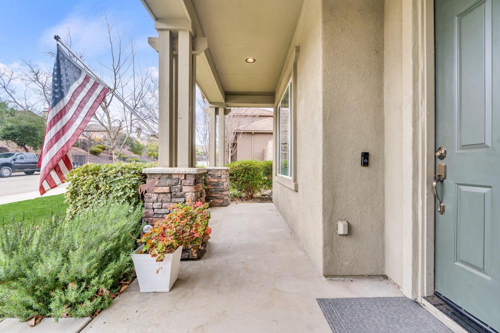 20300 Panoz Road Patterson, CA 95363 - Photo 5 of 61 a view of a house with a potted plant