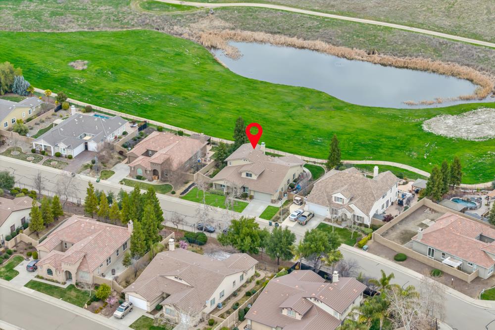 20300 Panoz Road Patterson, CA 95363 - Photo 54 of 61 an aerial view of residential houses with outdoor space and street view