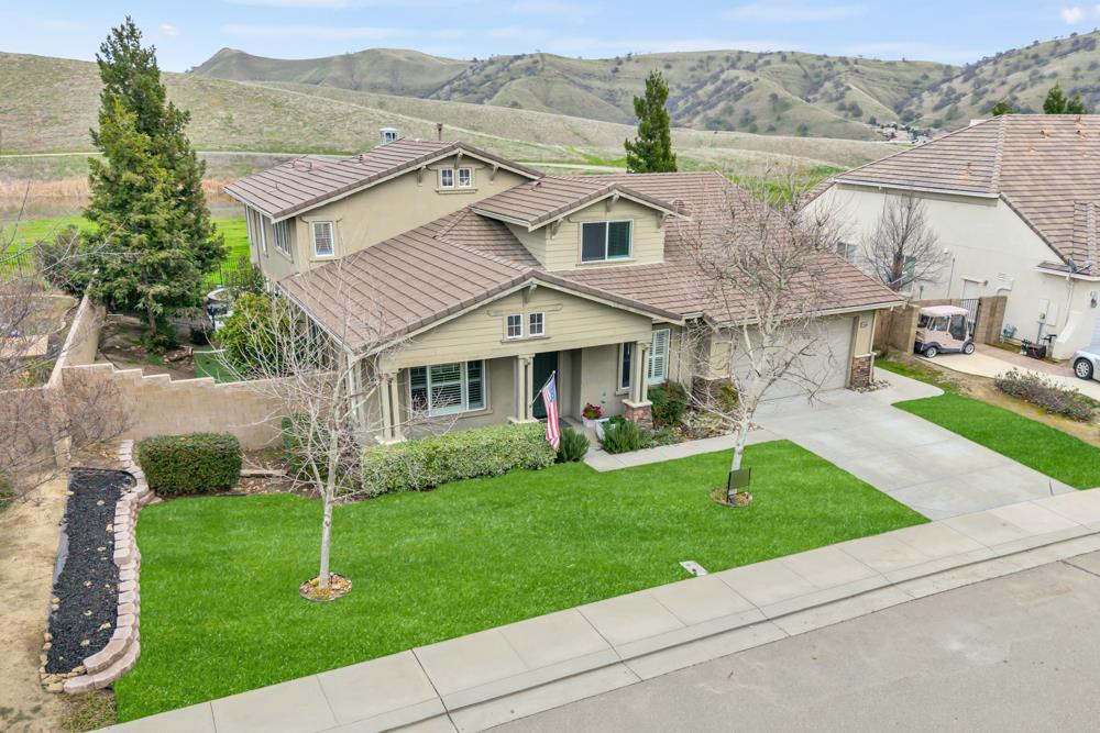 20300 Panoz Road Patterson, CA 95363 - Photo 55 of 61 a front view of house with yard and green space