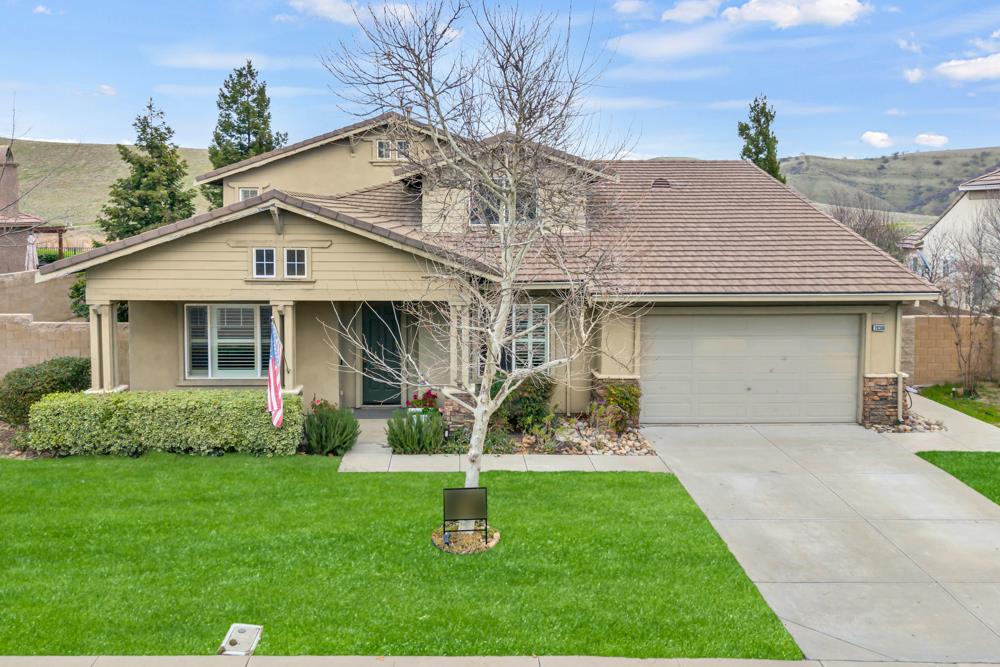 20300 Panoz Road Patterson, CA 95363 - Photo 56 of 61 a front view of a house with a yard