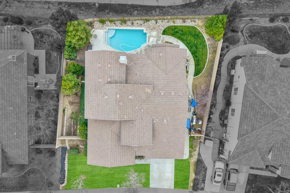 20300 Panoz Road Patterson, CA 95363 - Photo 58 of 61 a aerial view of a house with a yard
