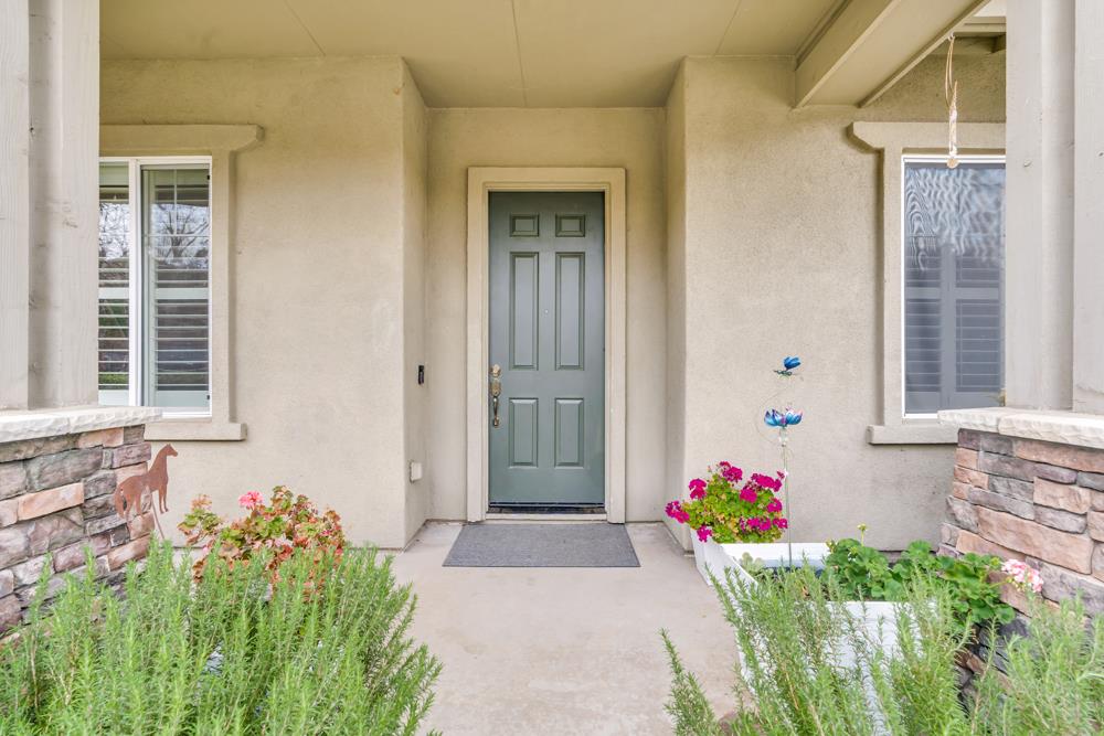 20300 Panoz Road Patterson, CA 95363 - Photo 6 of 61 a front view of a house