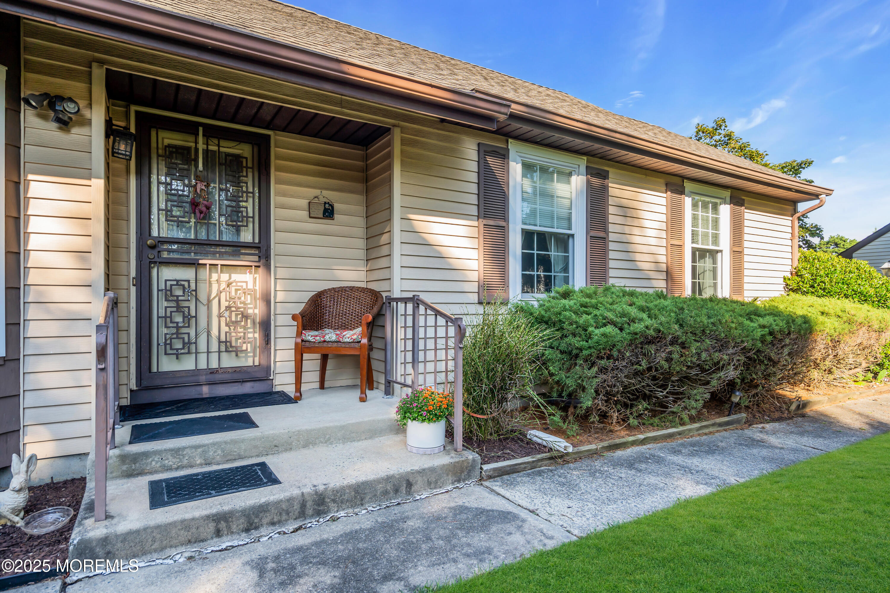 30 A Mill Road, Unit 64 Whiting, NJ 08759 - Photo 17 of 46 a house view with a garden space