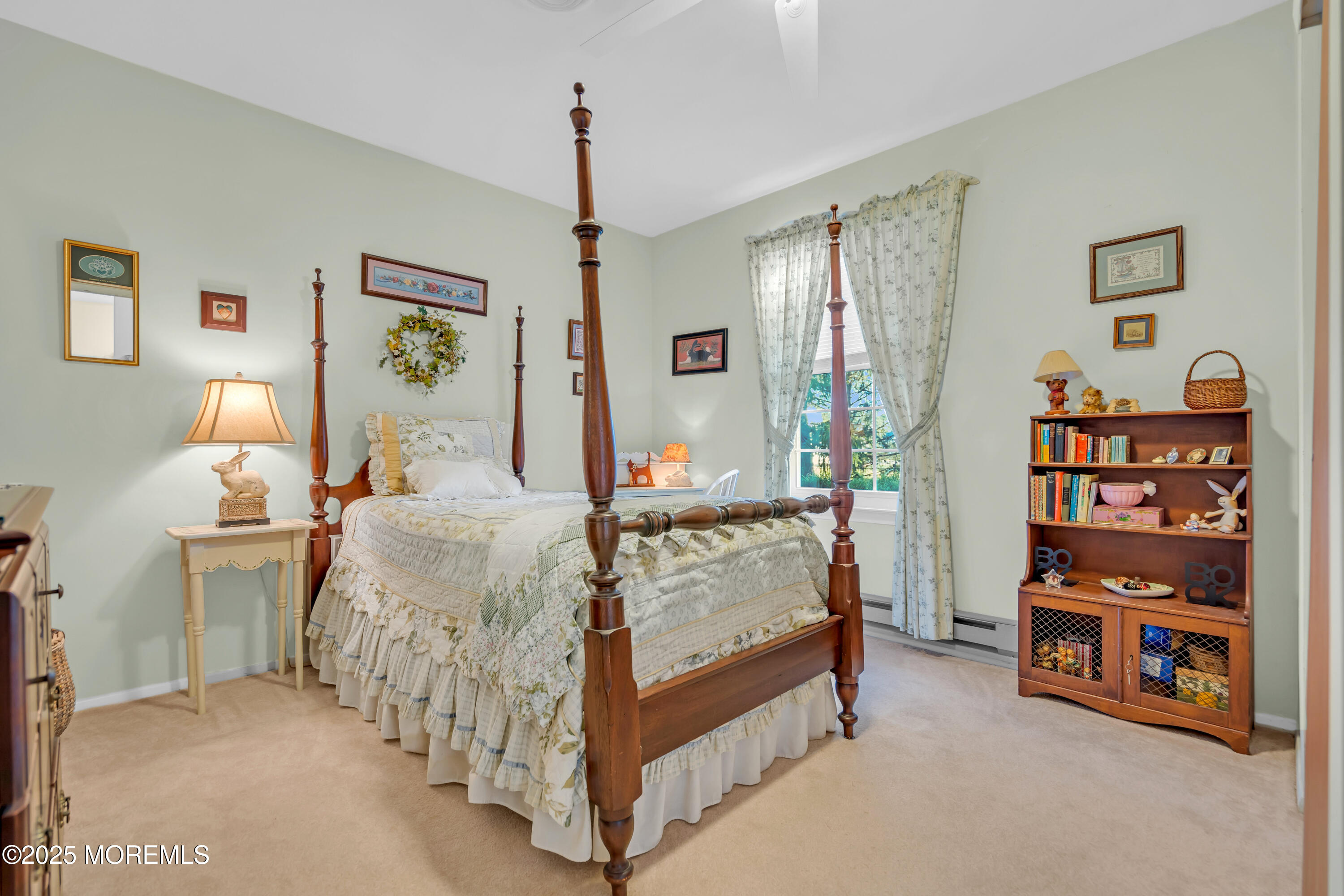 30 A Mill Road, Unit 64 Whiting, NJ 08759 - Photo 33 of 46 a bedroom with bed and a bookshelf