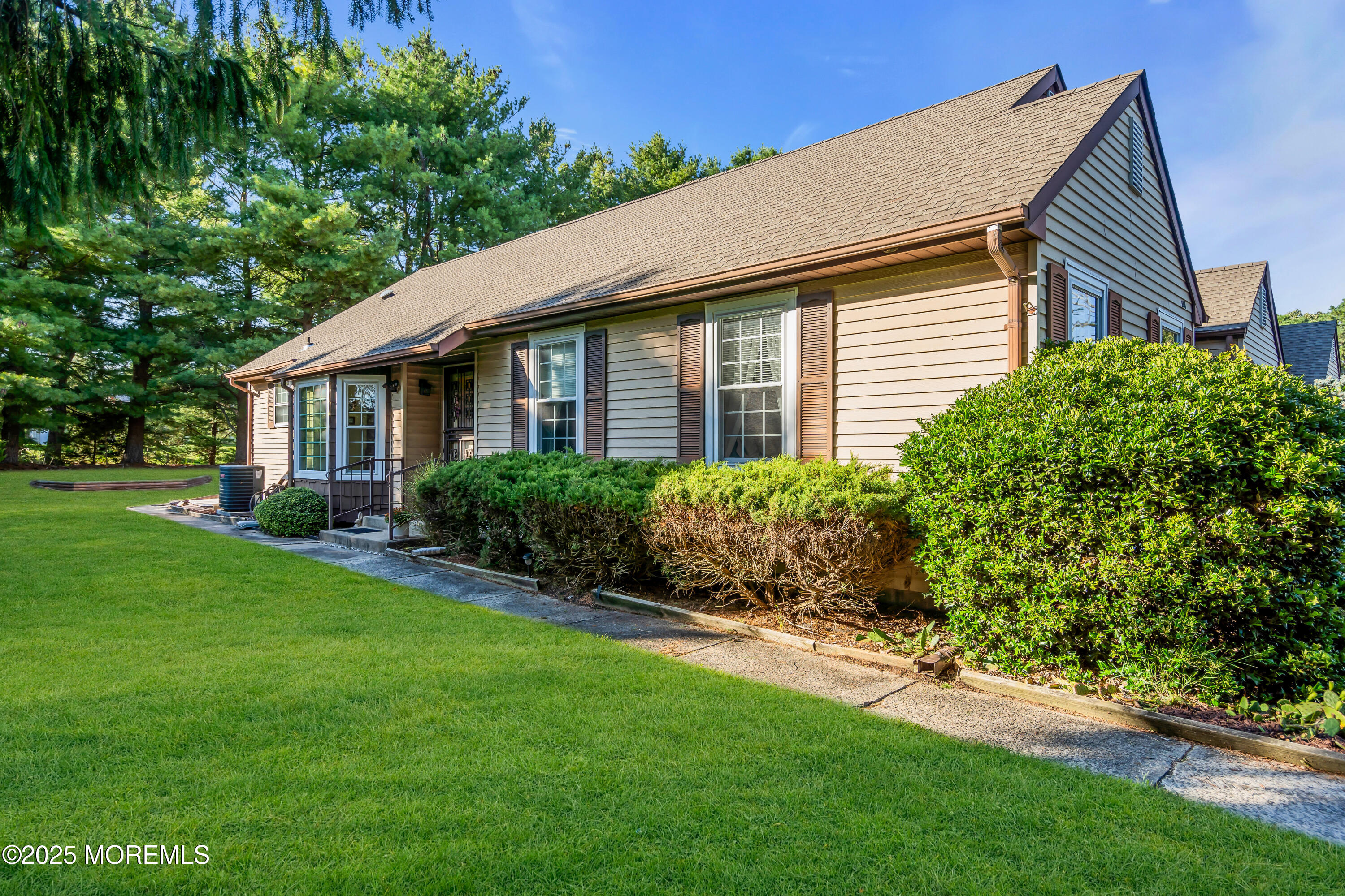 30 A Mill Road, Unit 64 Whiting, NJ 08759 - Photo 8 of 46 a view of a house with garden and yard