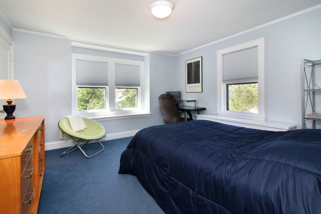 144 Lovell Road Watertown, MA 02472 - Photo 13 of 25 a bedroom with a bed and a window
