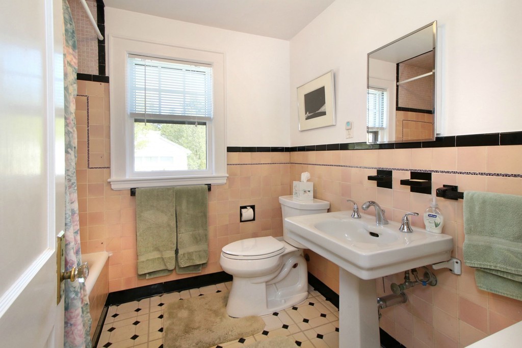 144 Lovell Road Watertown, MA 02472 - Photo 16 of 25 a bathroom with a sink toilet and mirror