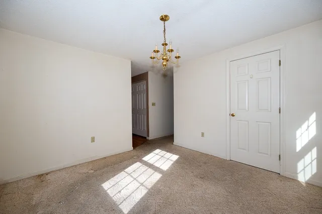a view of an empty room with window