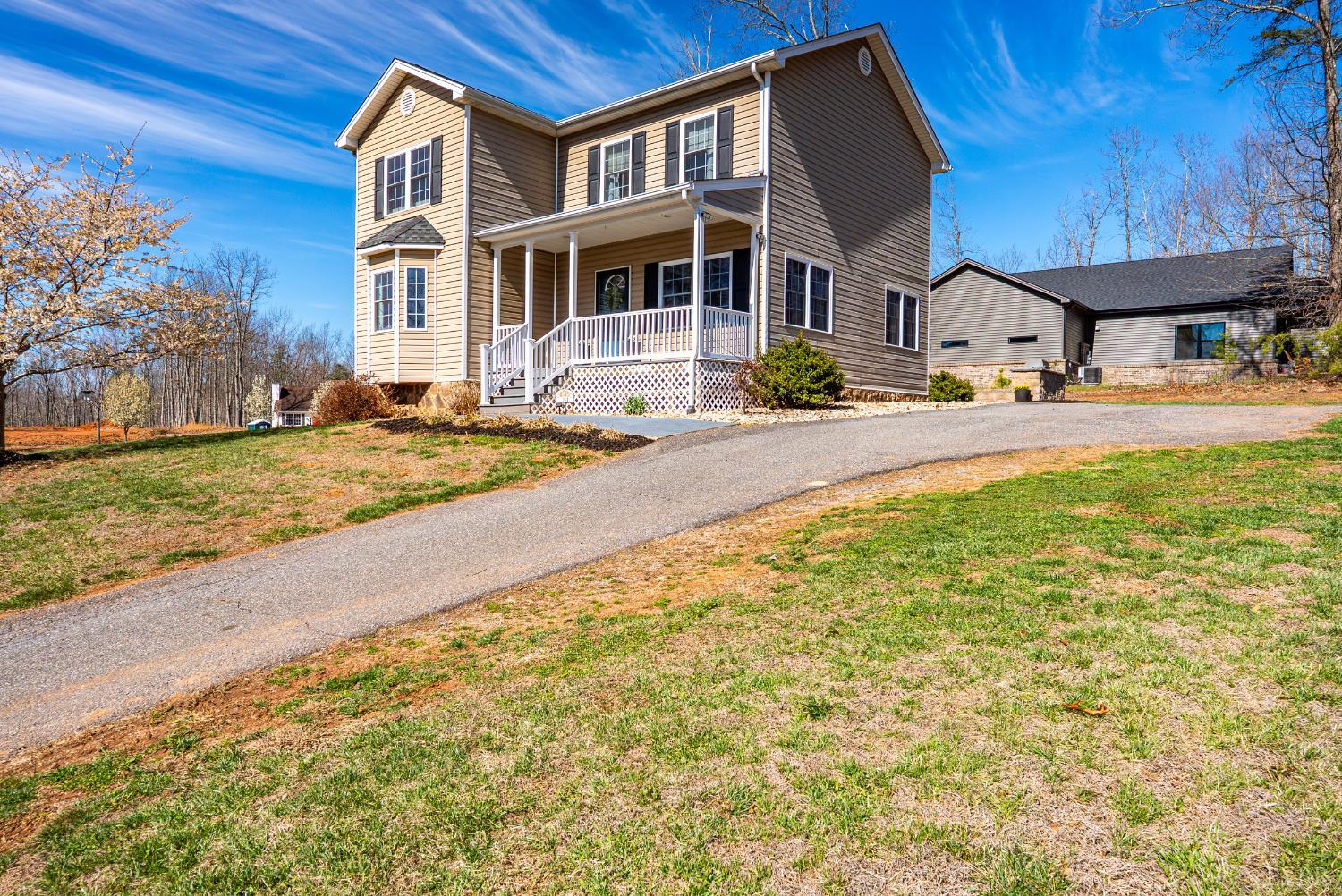 181 Armistead Lane Rustburg, VA 24588 - Photo 1 of 52 a front view of a house with swimming pool