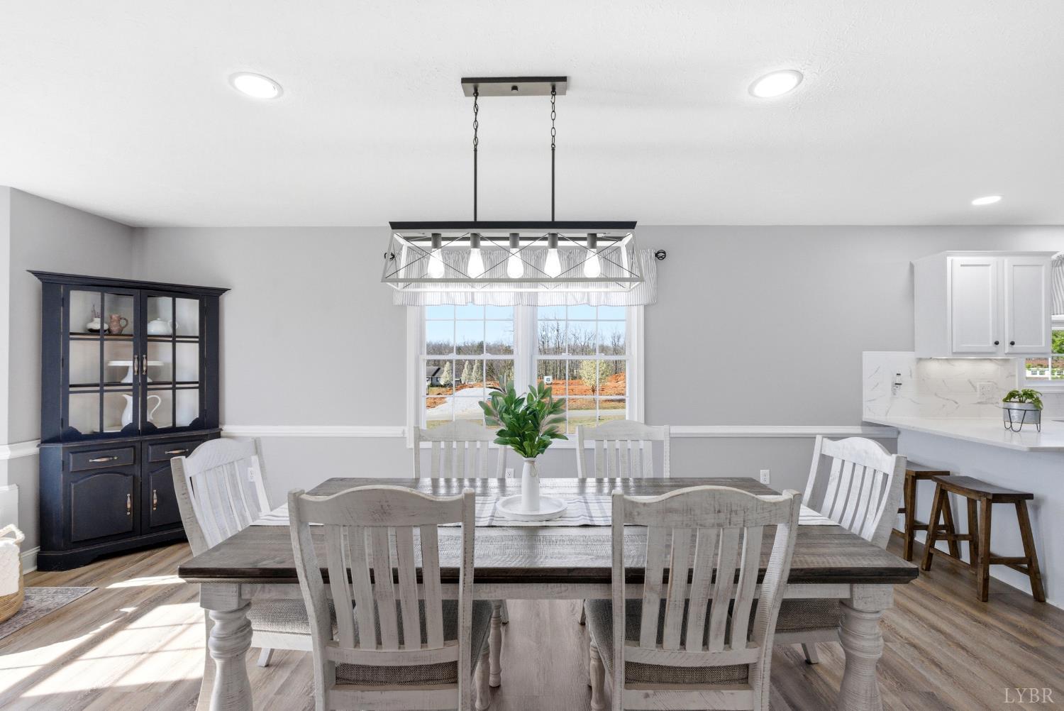 181 Armistead Lane Rustburg, VA 24588 - Photo 14 of 52 a view of a dining room with furniture window and outside view