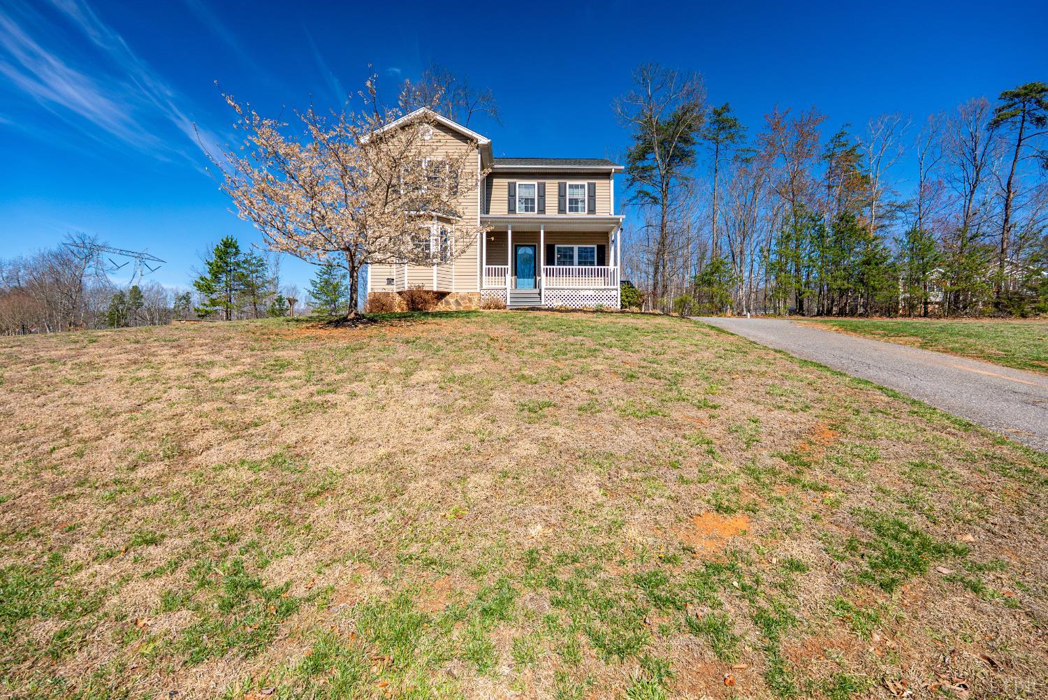 181 Armistead Lane Rustburg, VA 24588 - Photo 33 of 52 a front view of a building with a yard