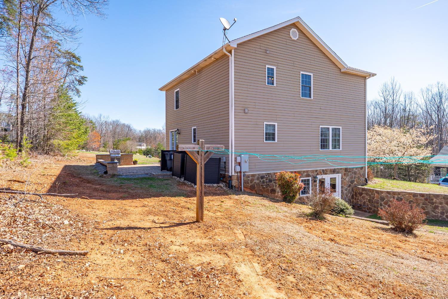 181 Armistead Lane Rustburg, VA 24588 - Photo 51 of 52 a view of a house with a yard