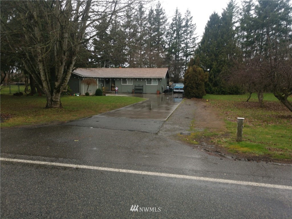 342 West Pole Road Lynden, WA 98264 - Photo 1 of 1 a front view of a house with a yard