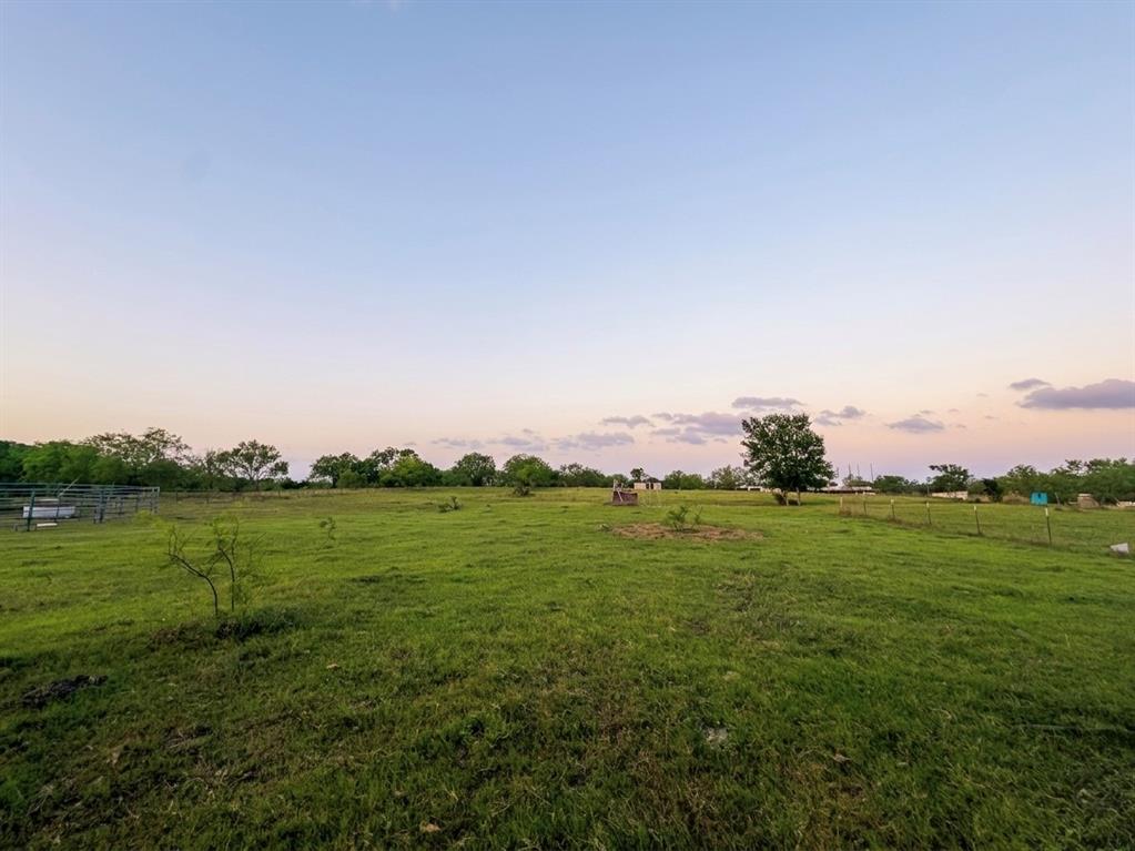 1030 East Rice Tx 75155 Rice, TX 75155 - Photo 5 of 6 a view of a grassy field with trees