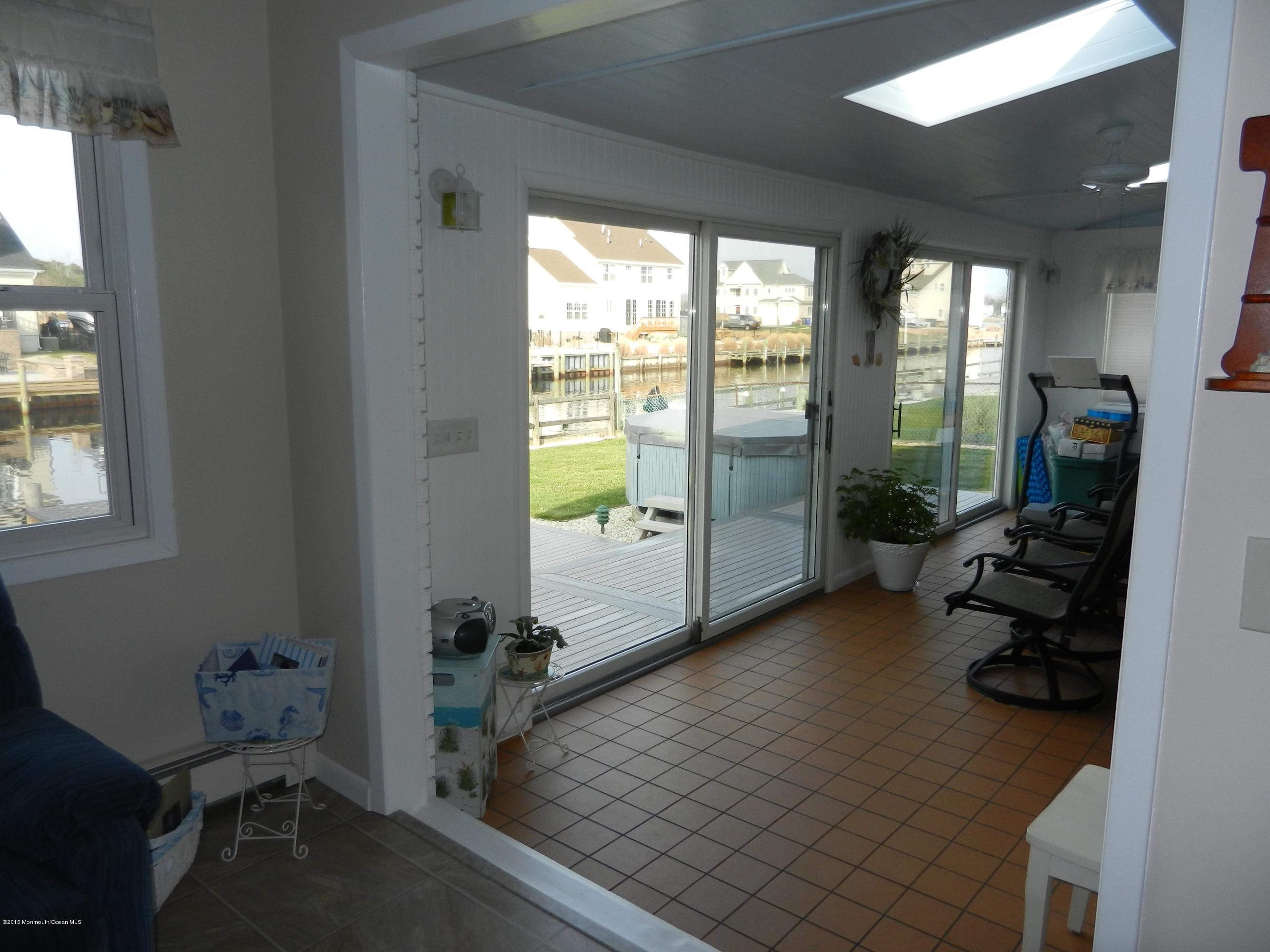 158 Cliff Road Brick, NJ 08724 - Photo 16 of 25 a room with furniture and a large window