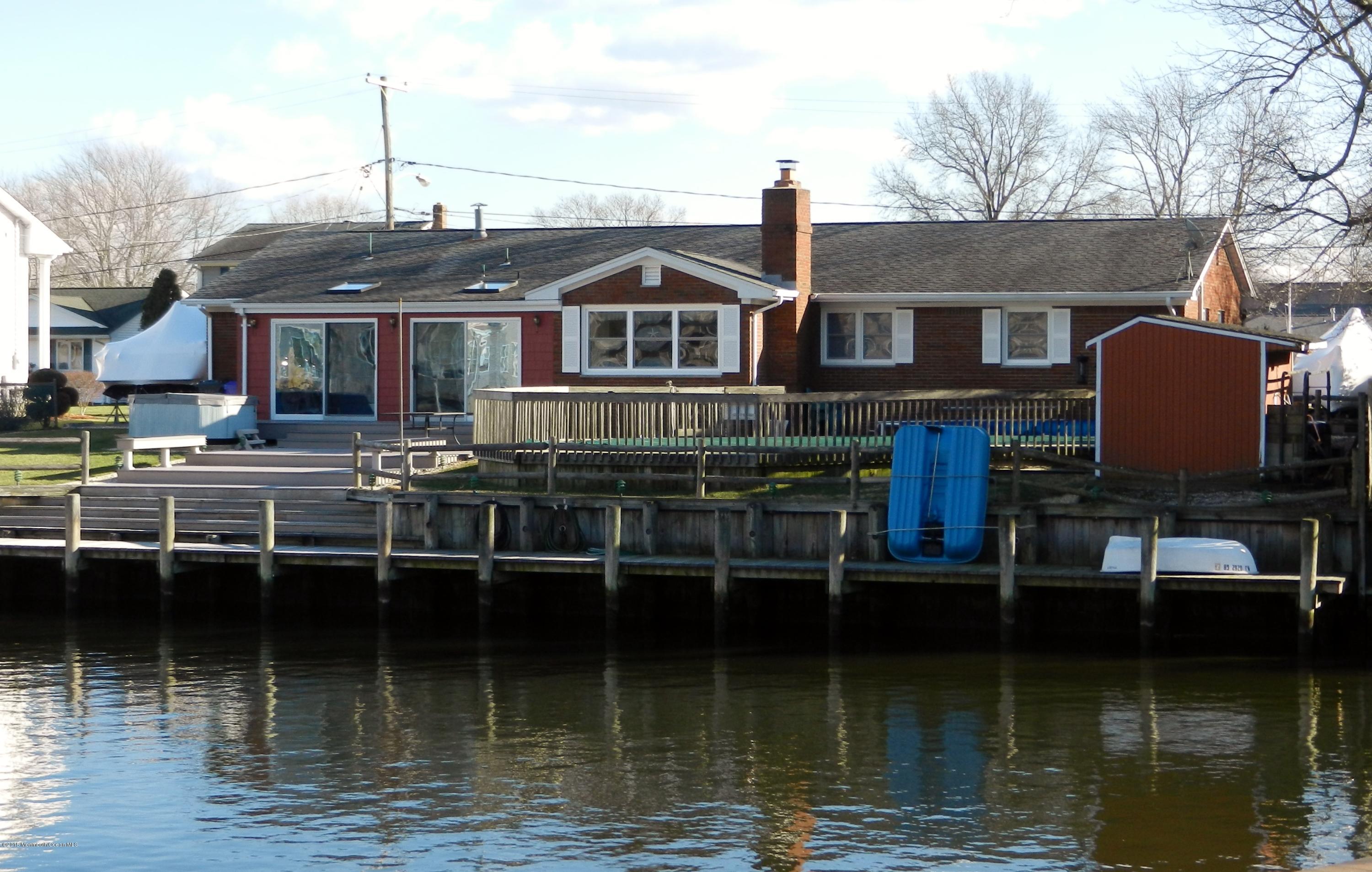 158 Cliff Road Brick, NJ 08724 - Photo 24 of 25 a front view of a house with a boat
