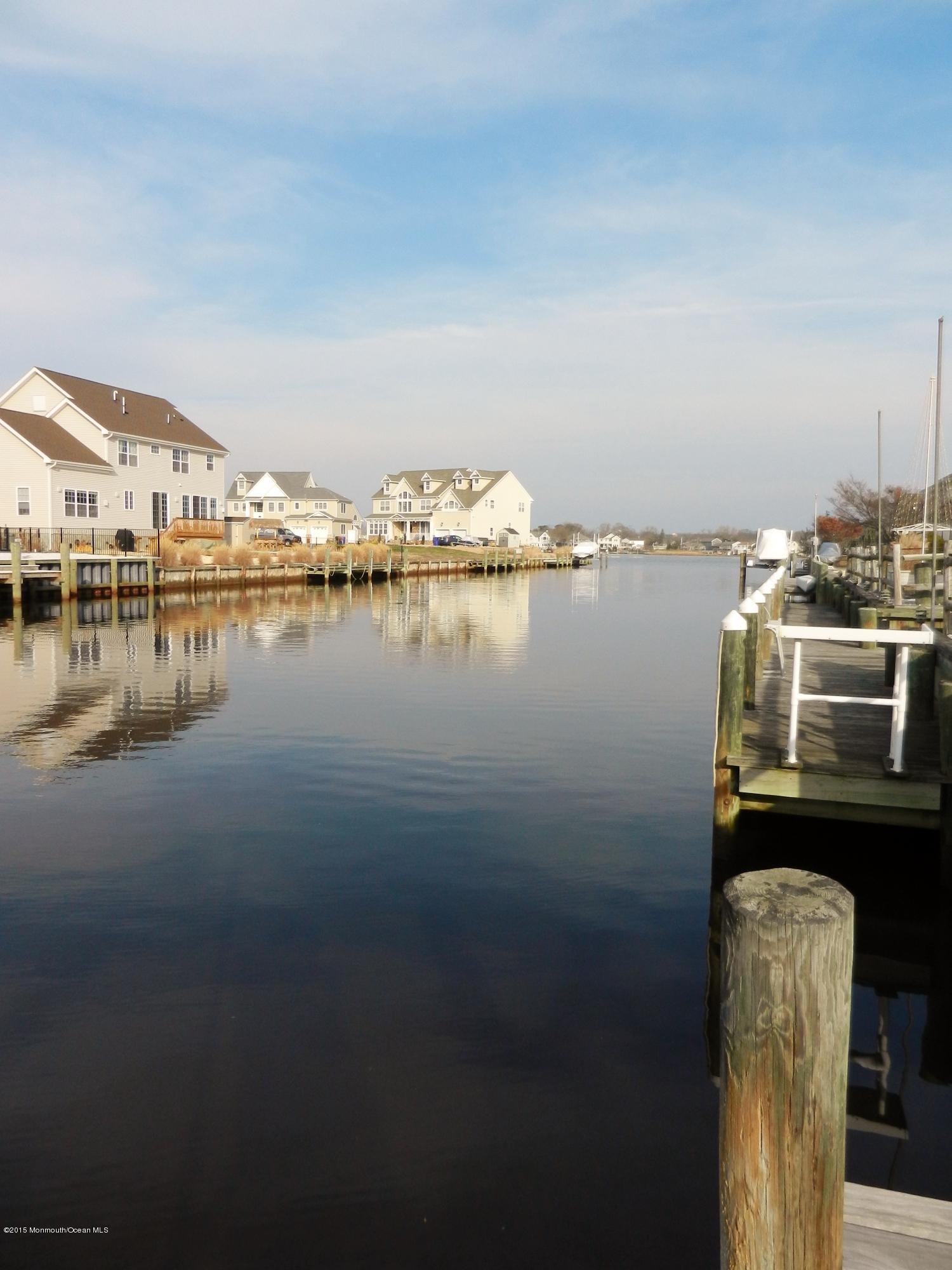 158 Cliff Road Brick, NJ 08724 - Photo 25 of 25 a view of a lake with houses