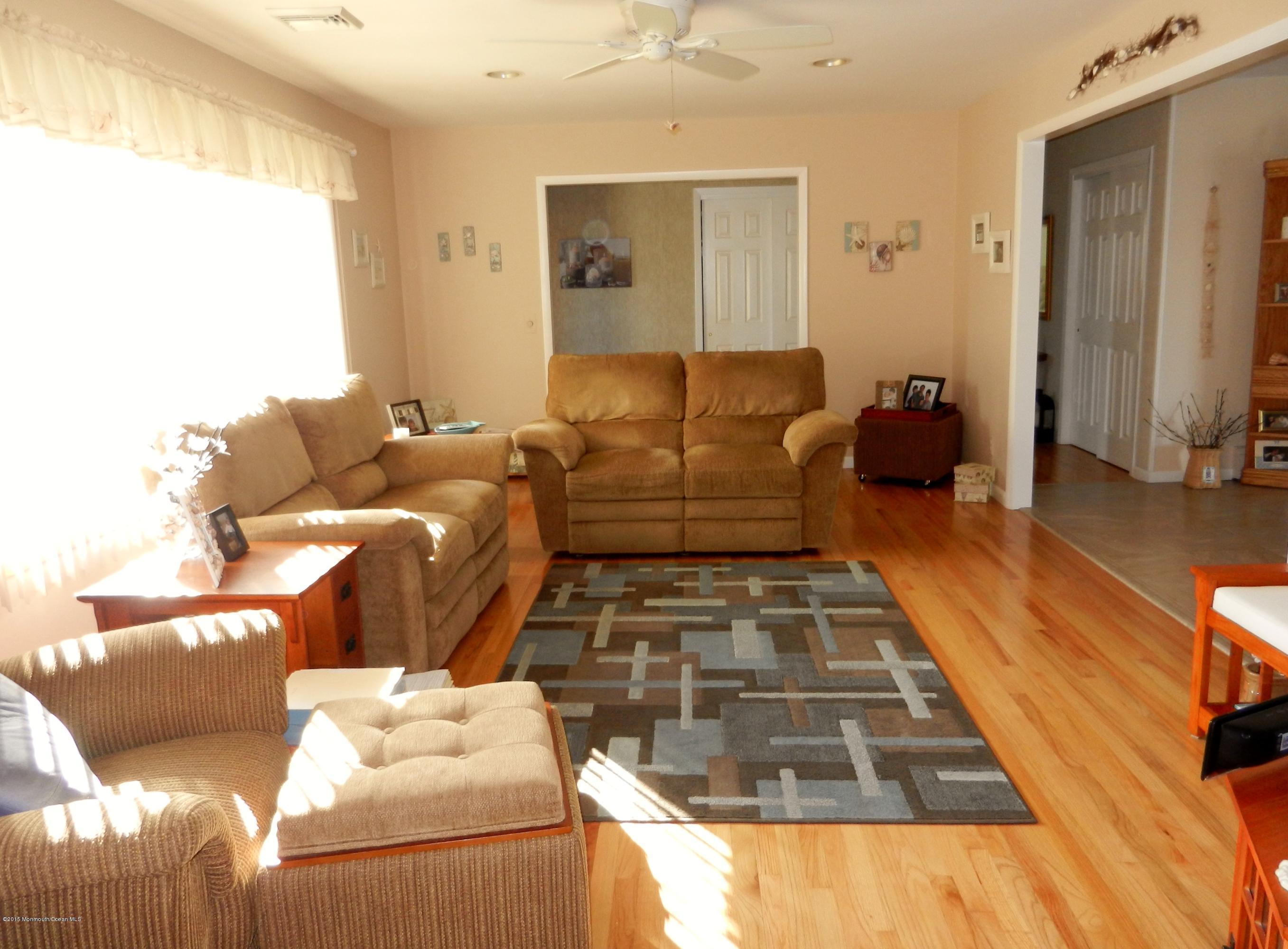 158 Cliff Road Brick, NJ 08724 - Photo 6 of 25 a living room with furniture and a rug