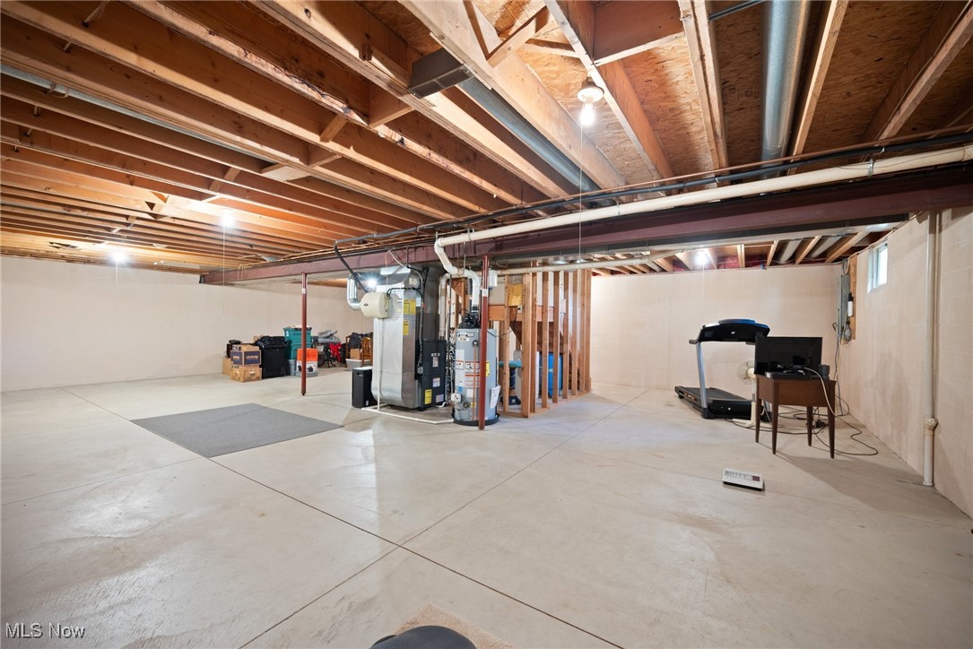 3190 Hamilton Road Medina, OH 44256 - Photo 27 of 37 Basement with heating unit and gas water heater