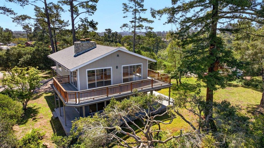 a house with trees in the background
