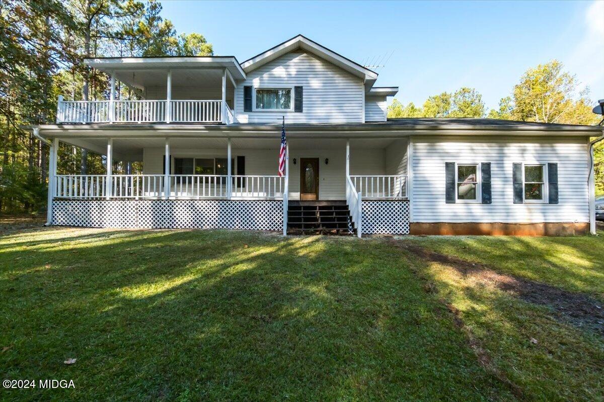 a house view with a garden space