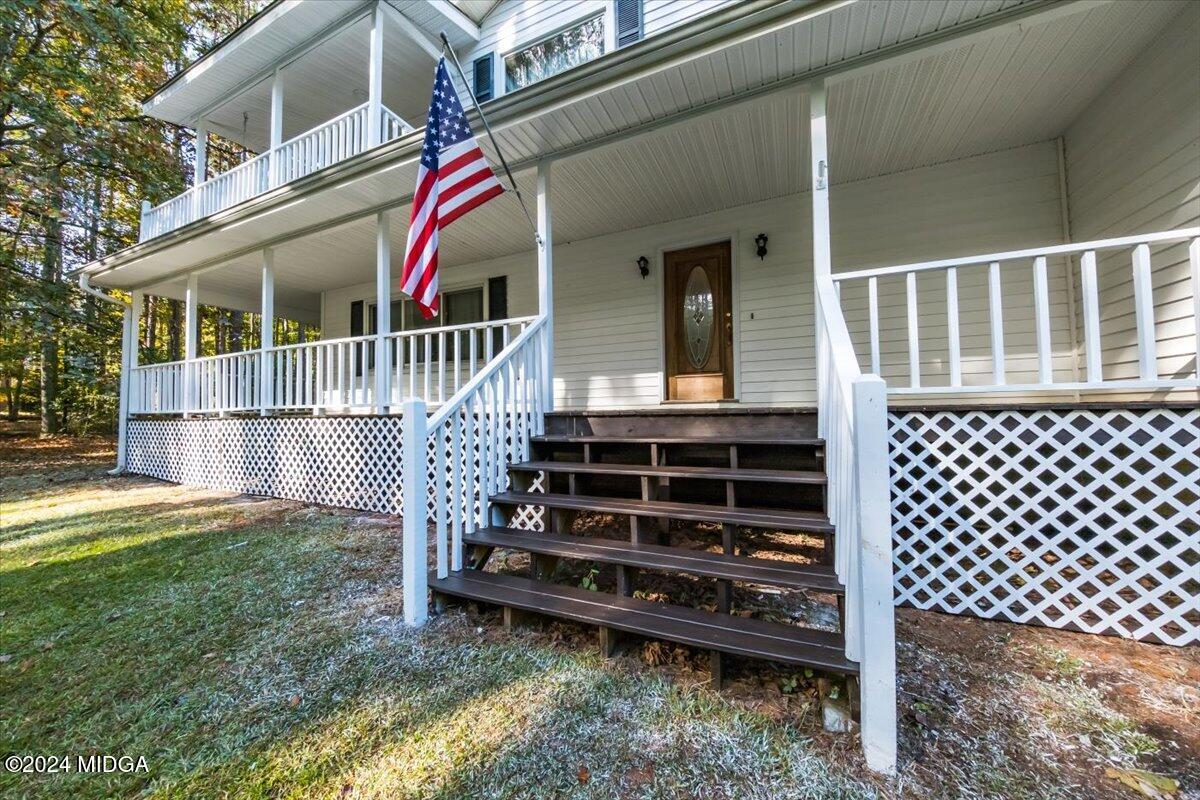 2559 Reedy Creek Road Forsyth, GA 31029 - Photo 3 of 20 a view of a house with a yard