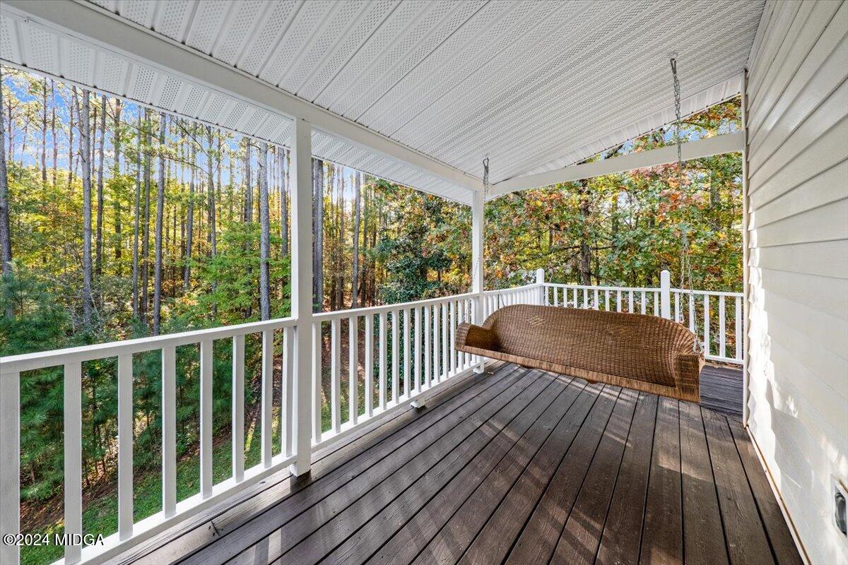 2559 Reedy Creek Road Forsyth, GA 31029 - Photo 10 of 20 a view of balcony with wooden floor