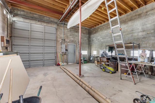 an aerial view of a house with outdoor space