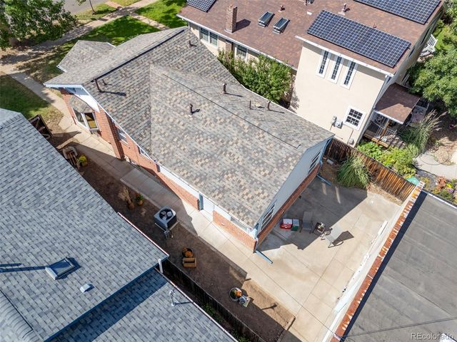 an aerial view of residential building with parking space and parking space