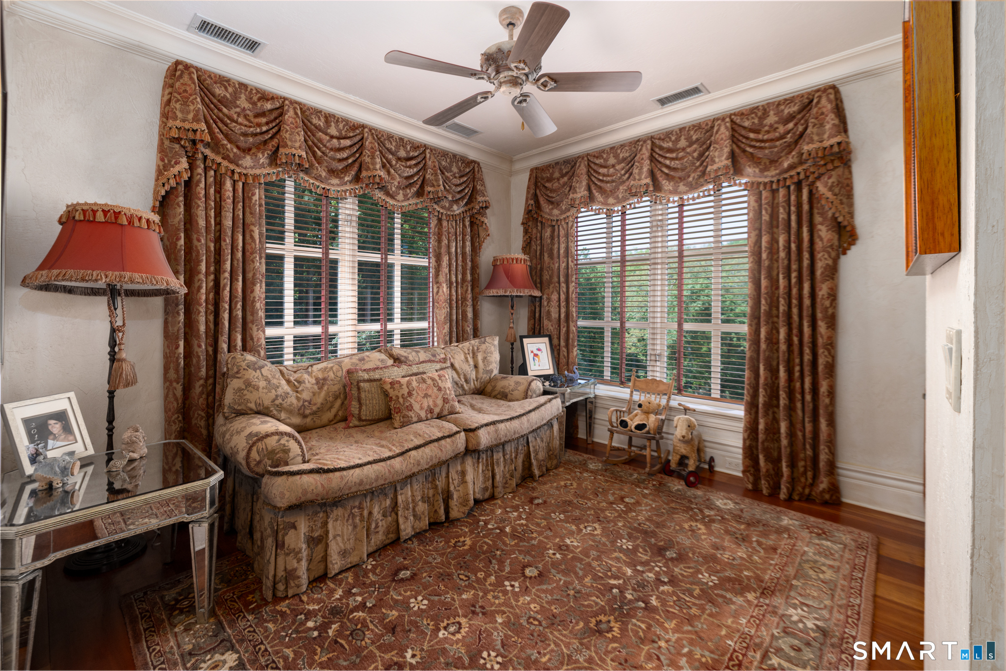 7 Equestrian Ridge Newtown, CT 06470 - Photo 27 of 40 a living room with furniture and a window