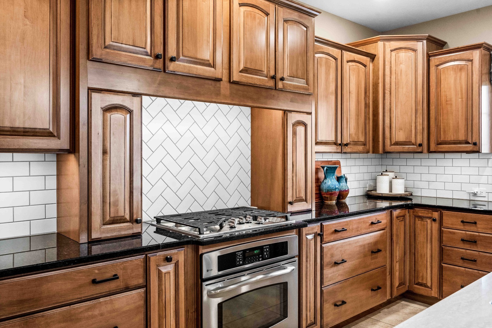 1048 Norway Court Normal, IL 61761 - Photo 21 of 83 a kitchen with stainless steel appliances granite countertop a stove a sink and a refrigerator