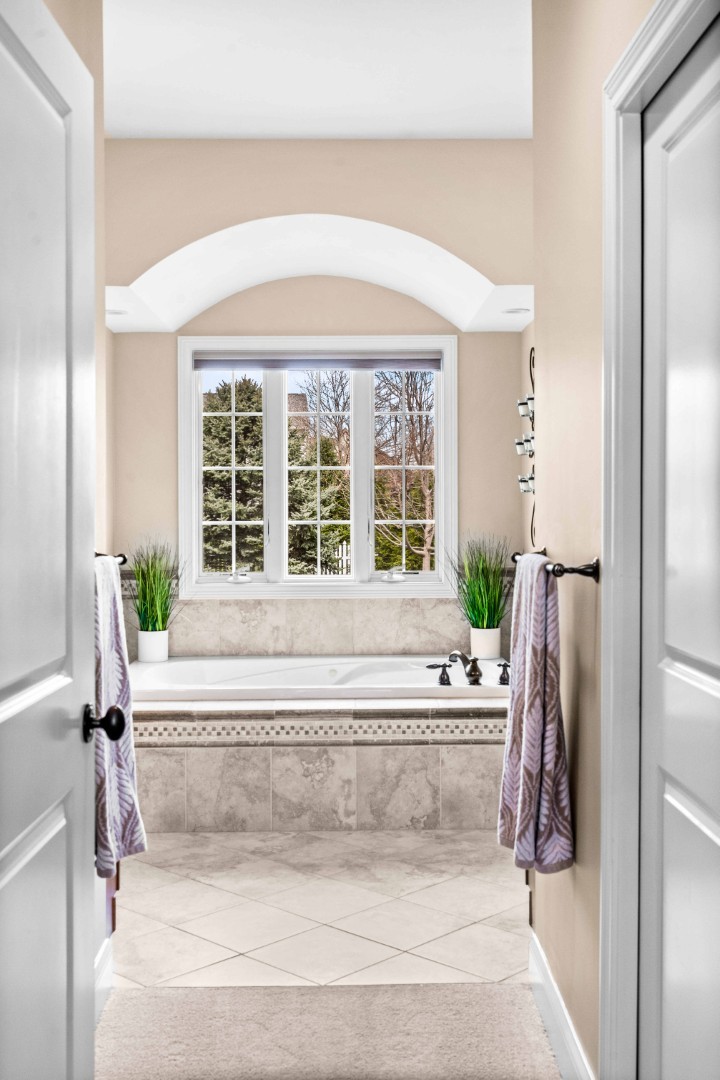 1048 Norway Court Normal, IL 61761 - Photo 32 of 83 a bathroom with a bathtub and shower