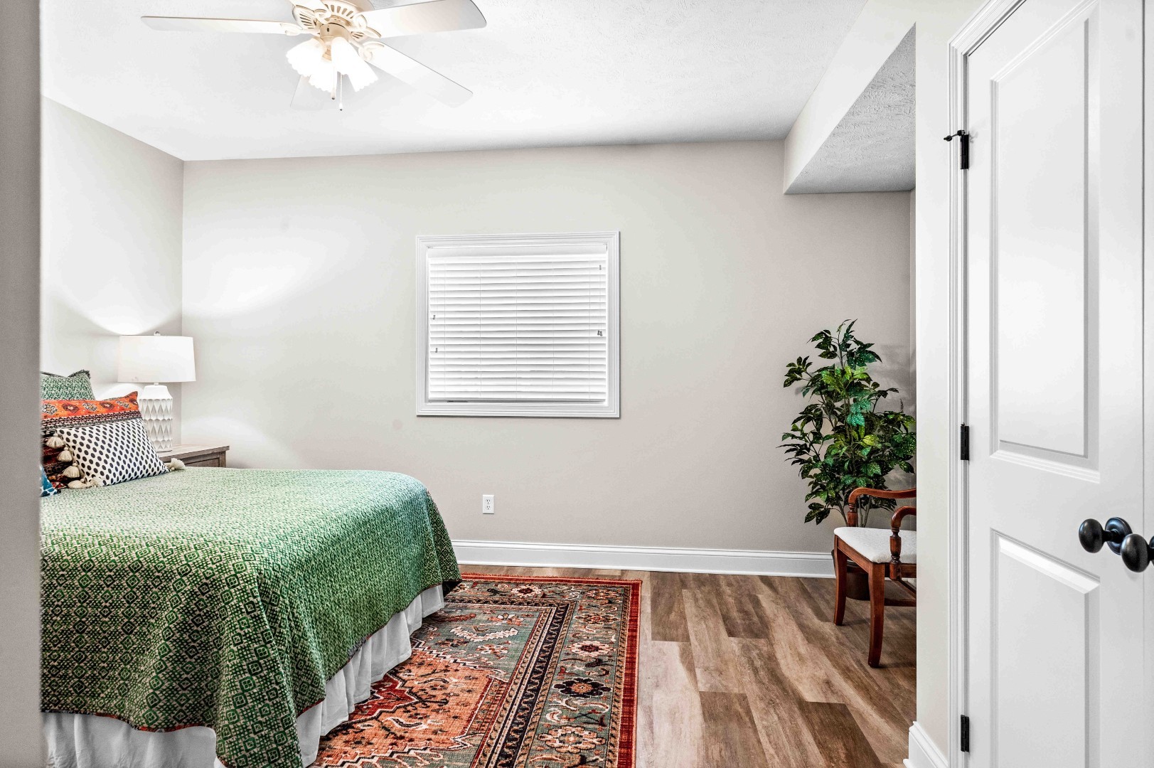 1048 Norway Court Normal, IL 61761 - Photo 51 of 83 a bedroom with a bed and a potted plant