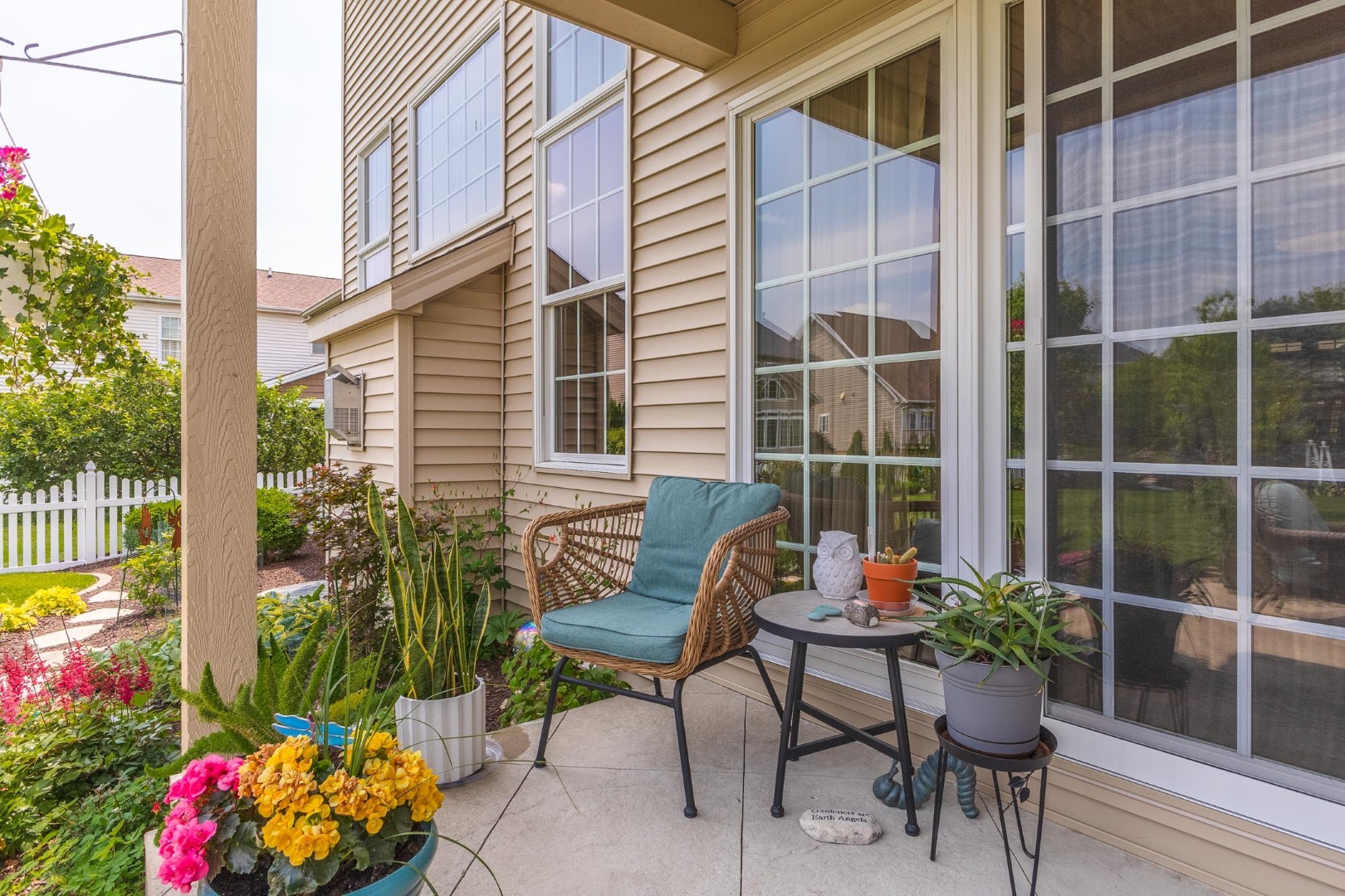 1048 Norway Court Normal, IL 61761 - Photo 63 of 83 a view of a chair and table in backyard of the house