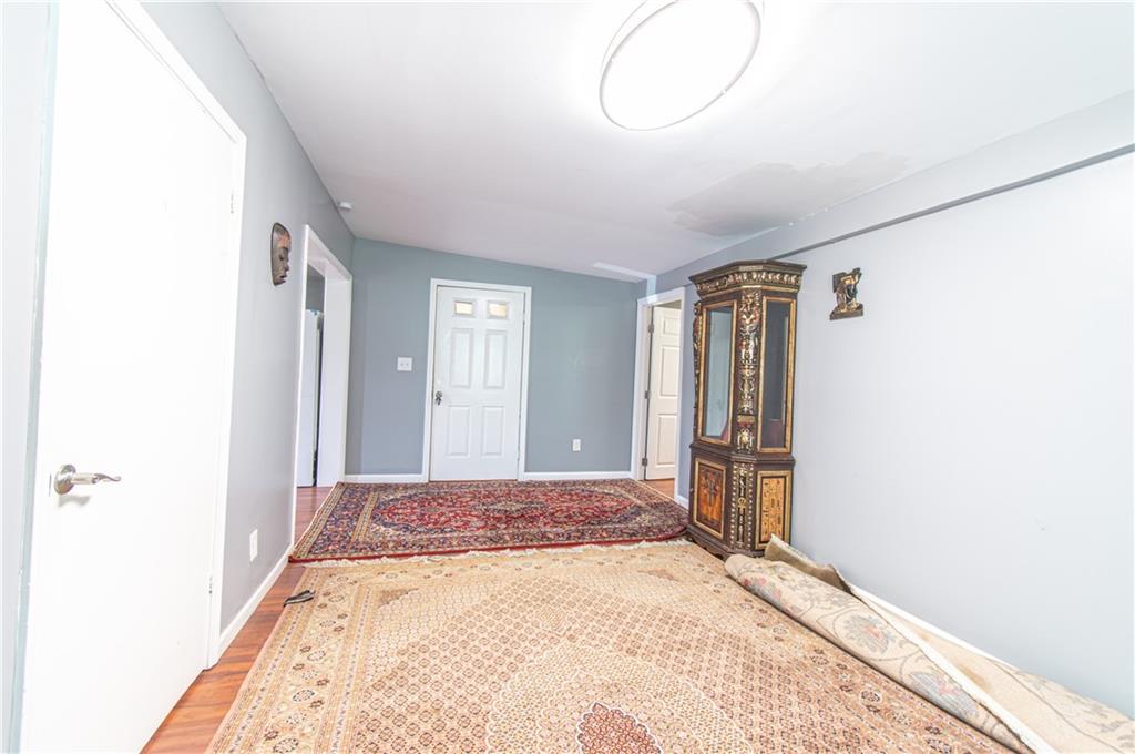 5646 Price Road Gainesville, GA 30506 - Photo 11 of 11 a view of a room with wooden floor and windows