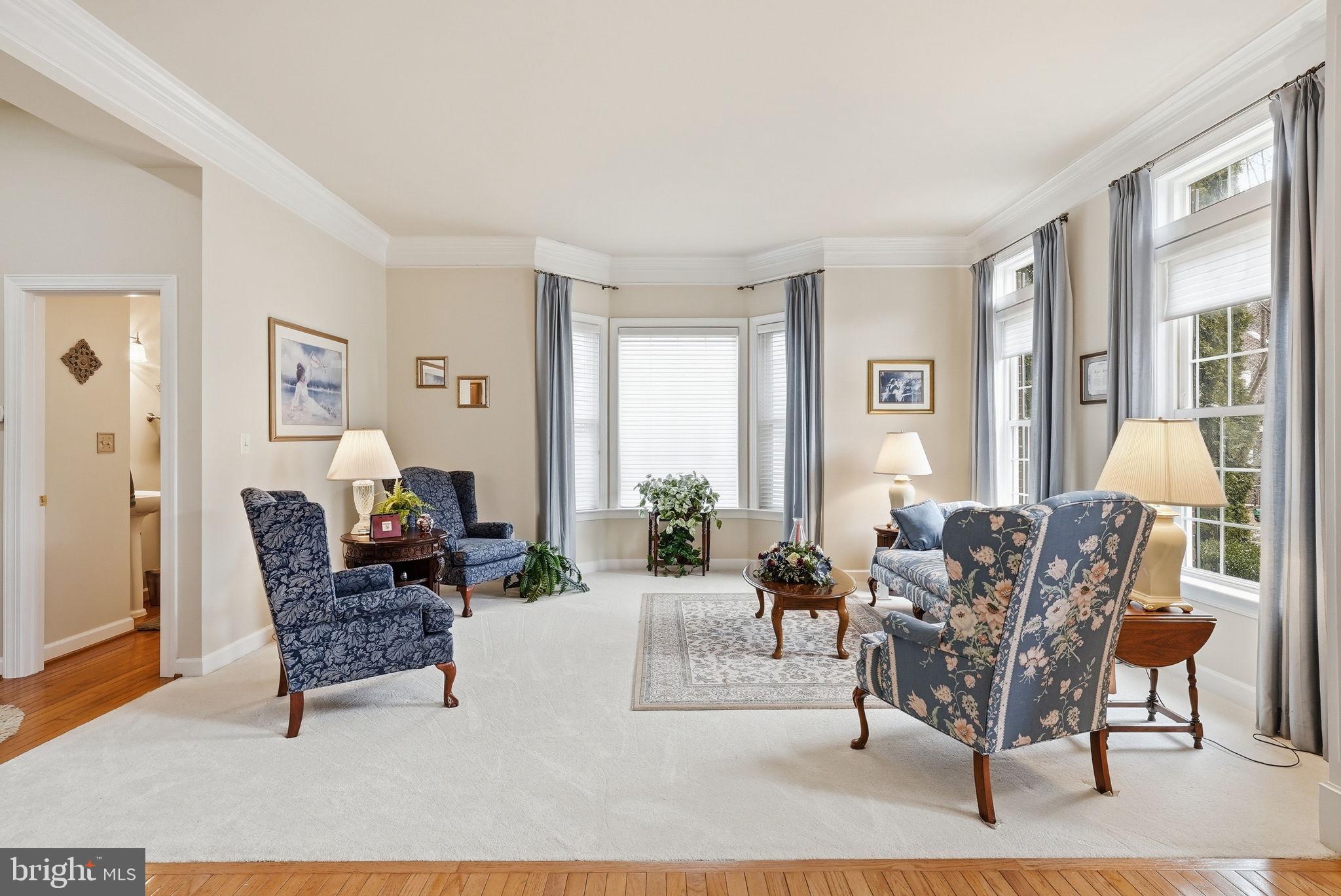 7820 Rose Garden Lane Springfield, VA 22153 - Photo 12 of 65 a living room with furniture and a large window