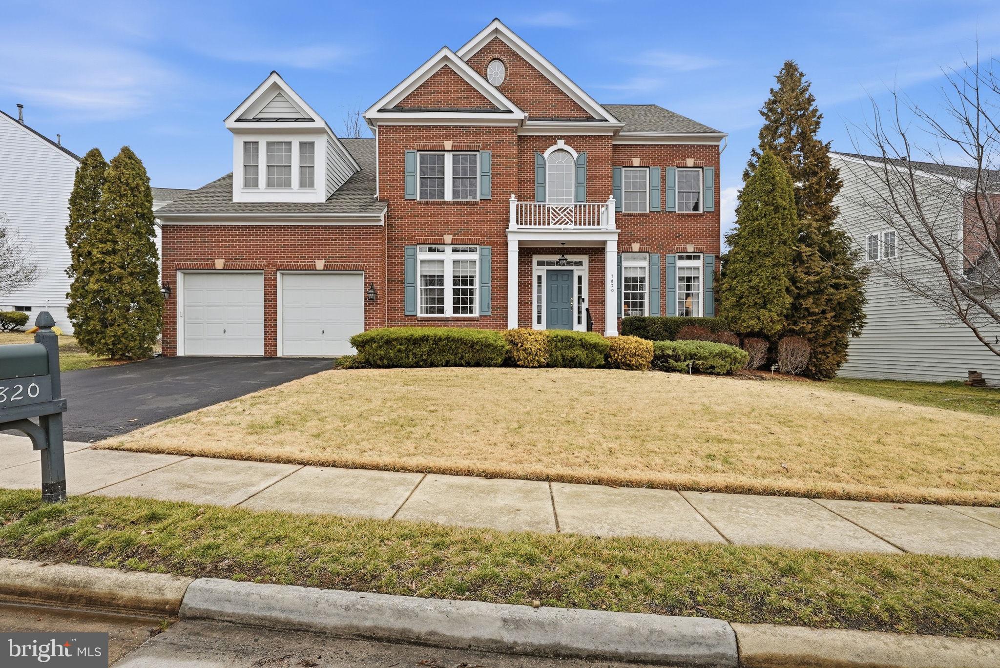 7820 Rose Garden Lane Springfield, VA 22153 - Photo 2 of 65 a front view of a house