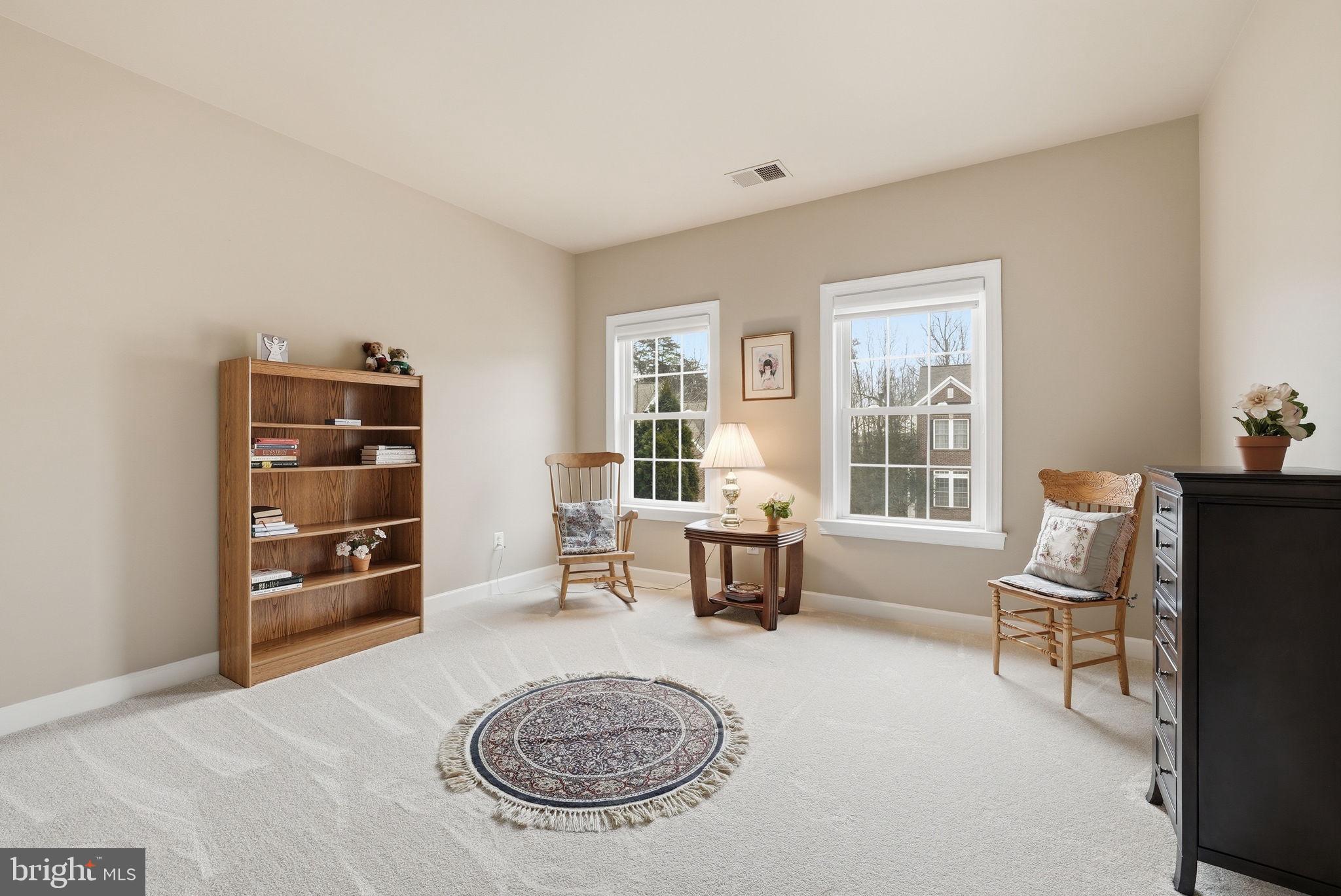 7820 Rose Garden Lane Springfield, VA 22153 - Photo 33 of 65 a living room with furniture and a window