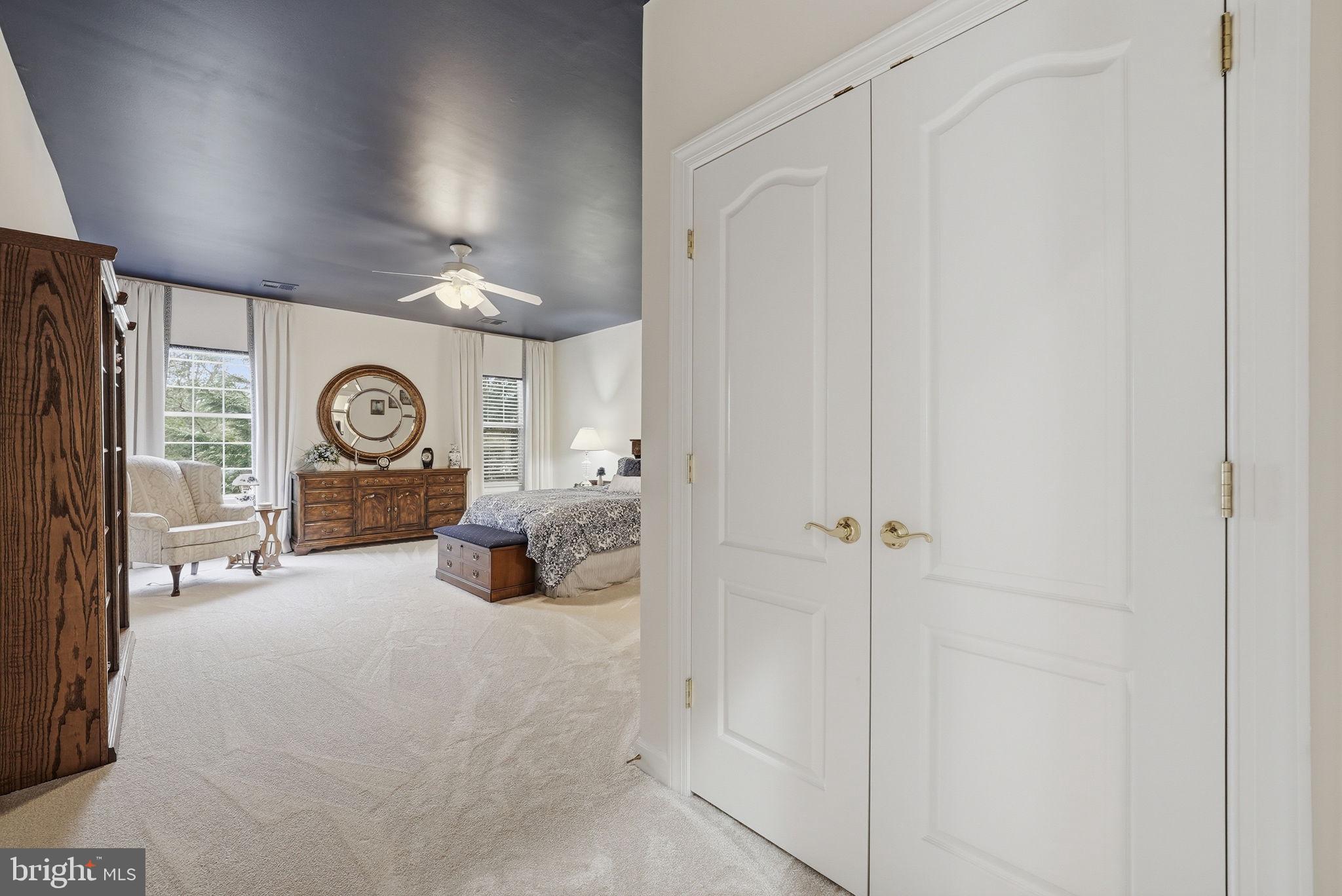 7820 Rose Garden Lane Springfield, VA 22153 - Photo 35 of 65 a very nice looking room with a large window and chandelier
