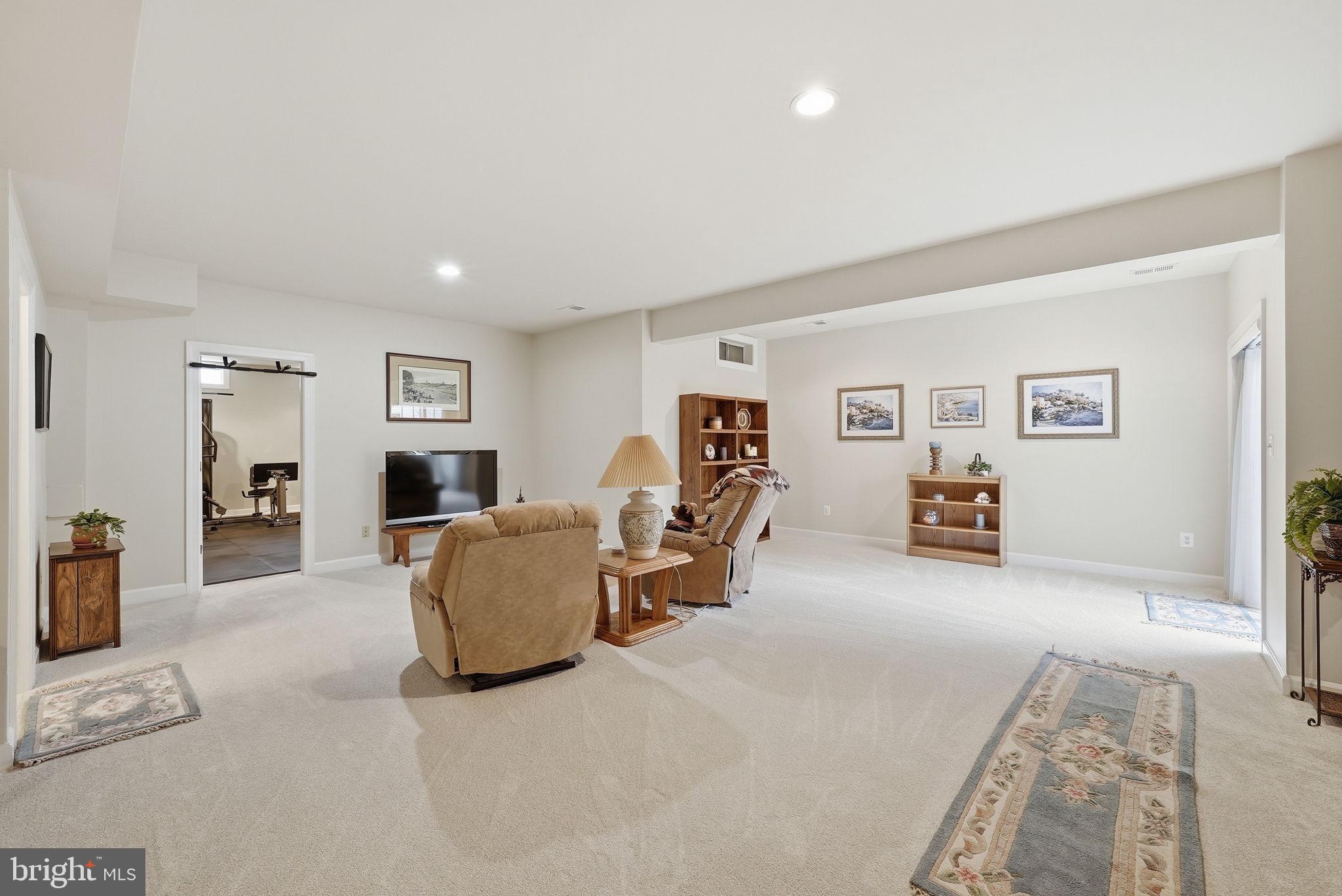 7820 Rose Garden Lane Springfield, VA 22153 - Photo 51 of 65 a living room with furniture and a couch