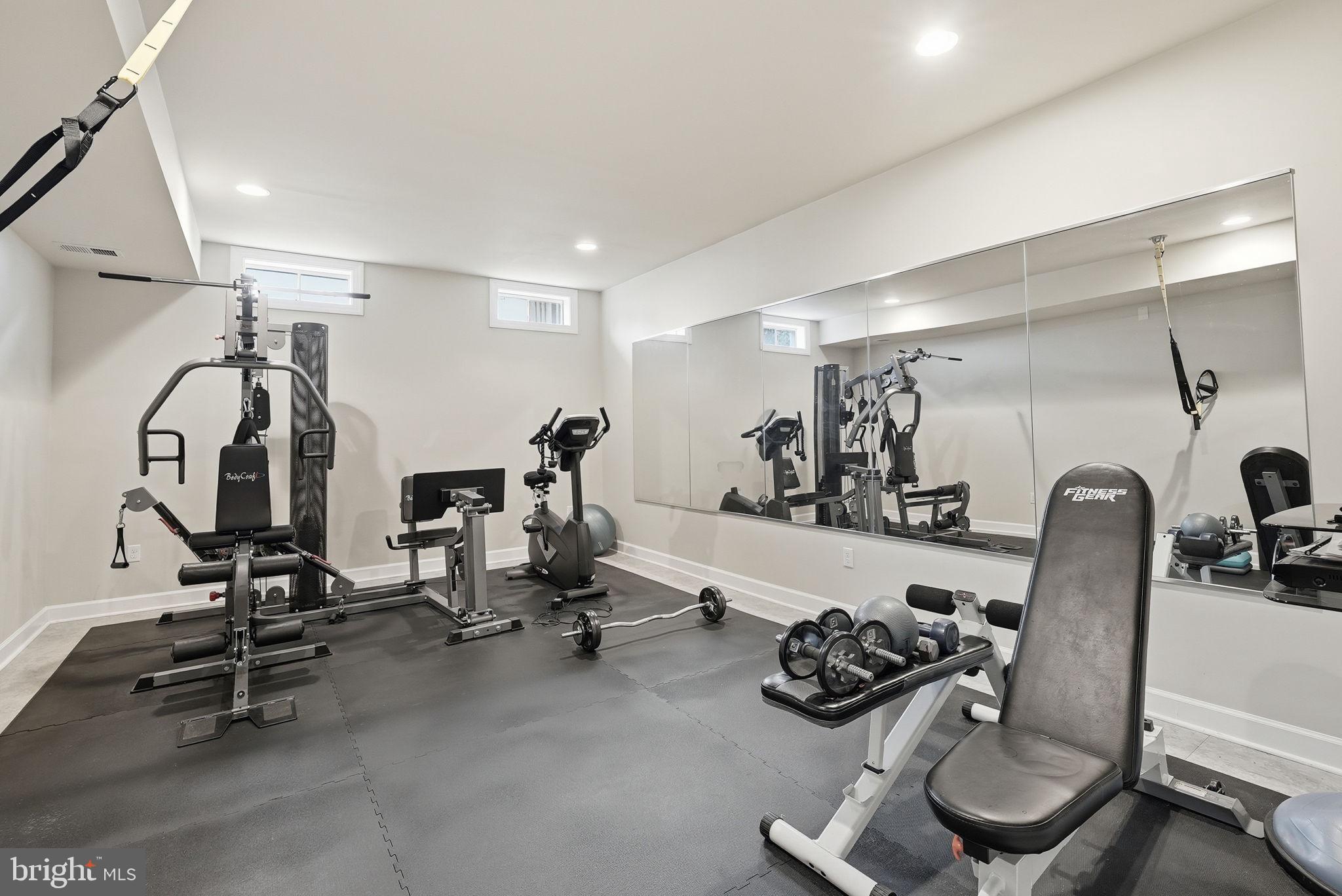 7820 Rose Garden Lane Springfield, VA 22153 - Photo 55 of 65 a view of a room with gym equipment