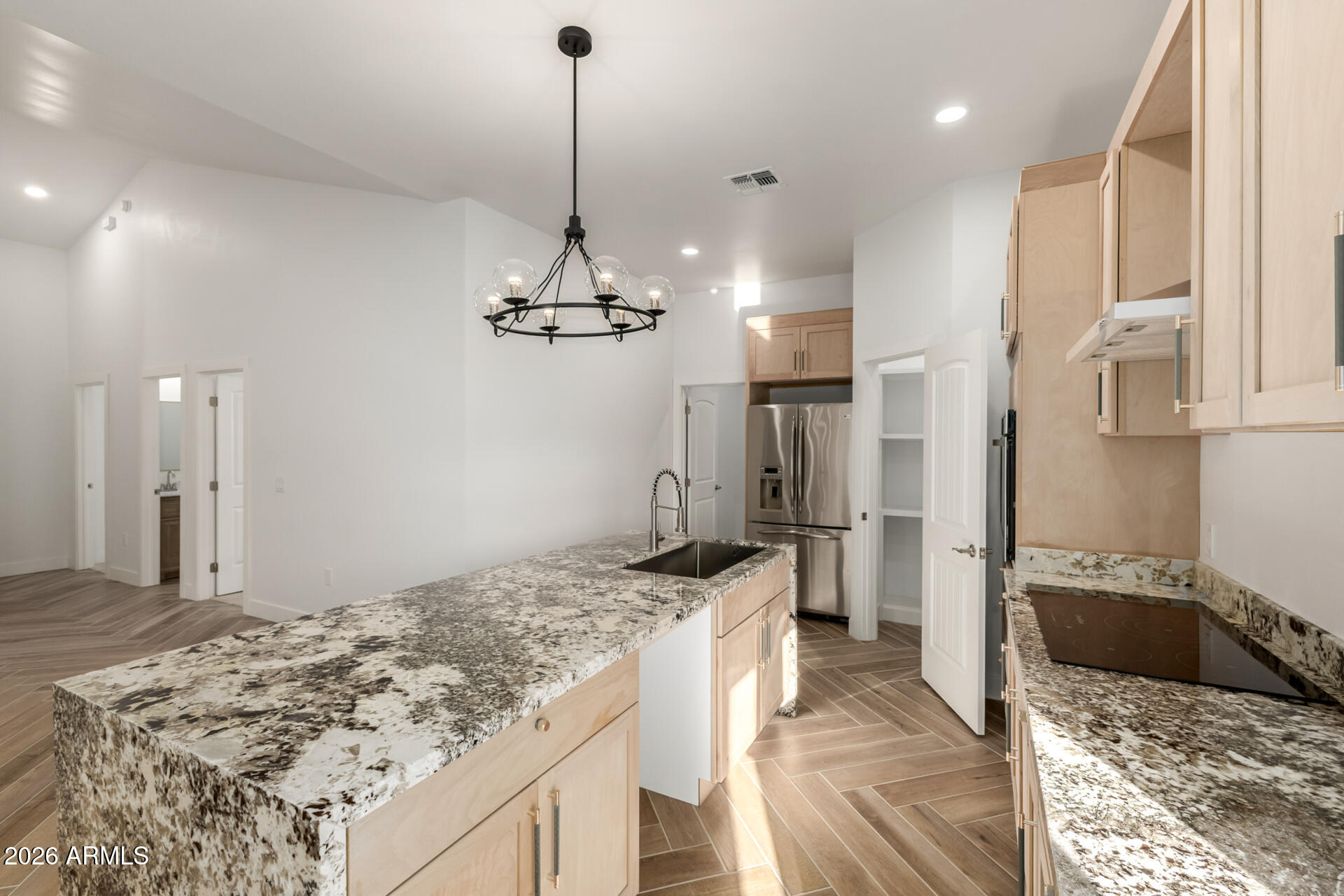 6345 West Grandview Road Glendale, AZ 85306 - Photo 17 of 36 a kitchen with a sink stove and refrigerator