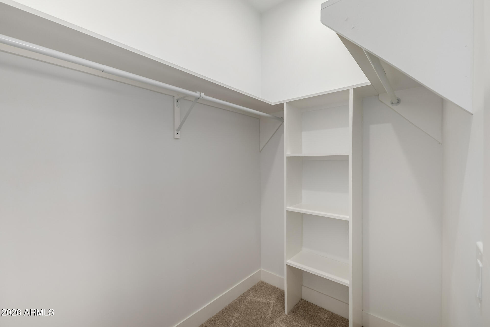 6345 West Grandview Road Glendale, AZ 85306 - Photo 24 of 36 a view of an empty walk in closet