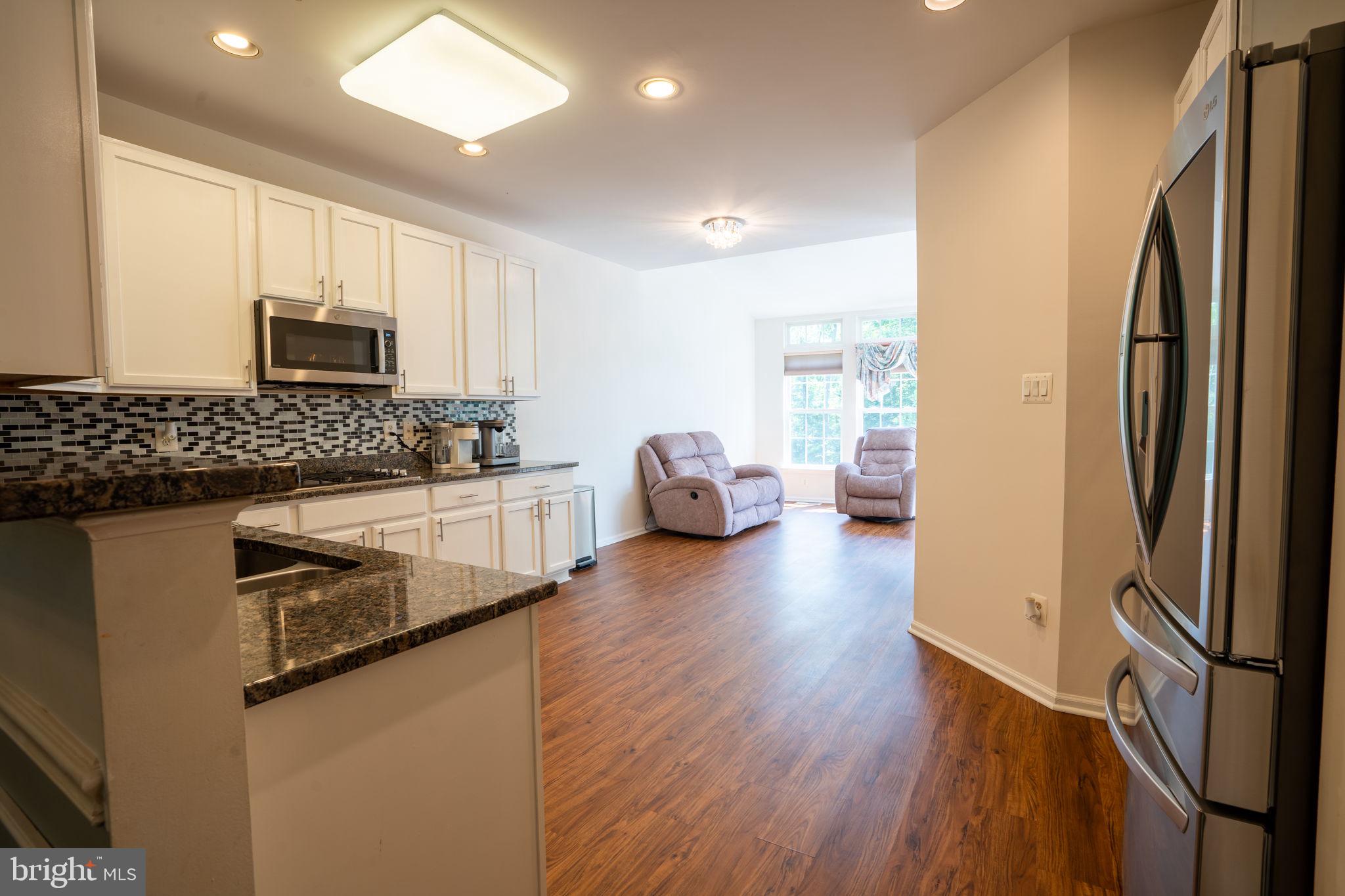 8507 Meadowsweet Road, Unit 8507 Pikesville, MD 21208 - Photo 11 of 45 Kitchen a