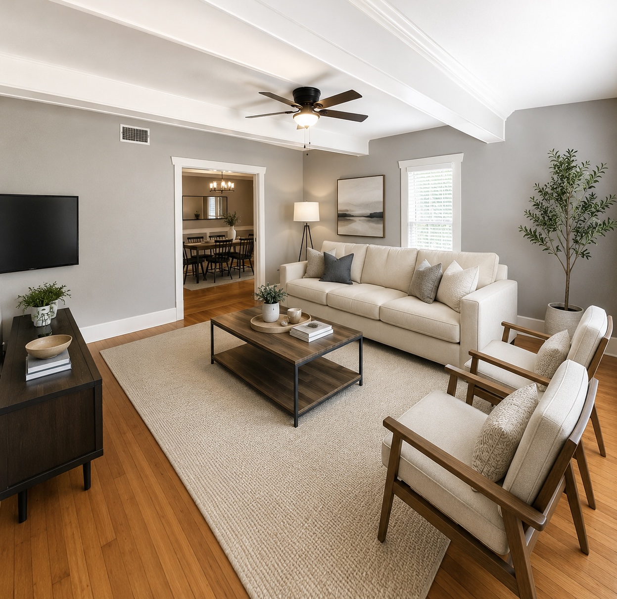 423 South Main Street Lockhart, TX 78644 - Photo 4 of 26 Bright living room featuring wood-finish flooring, white trim, a decorative ceiling fan, and recessed lighting