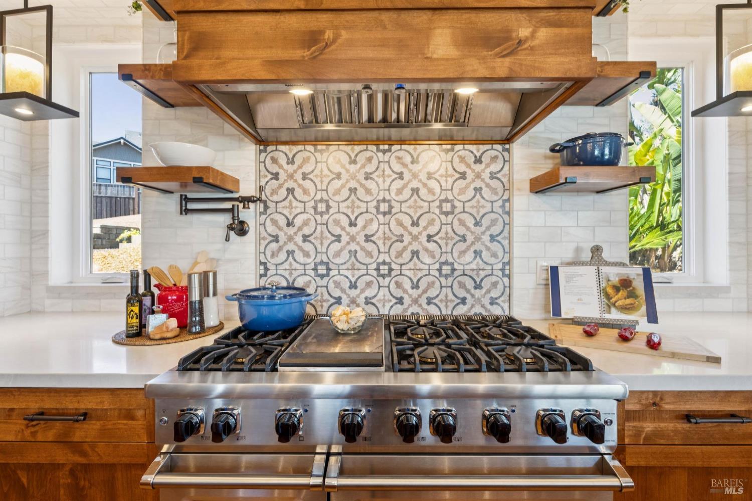 3882 Royal Manor Place Santa Rosa, CA 95404 - Photo 13 of 87 Cooking will be a joy with your stainless steel Professional Grade 48” Viking range with 6 burners and built-in griddle dual gas ovens, pot filler and an industrial grade vent.