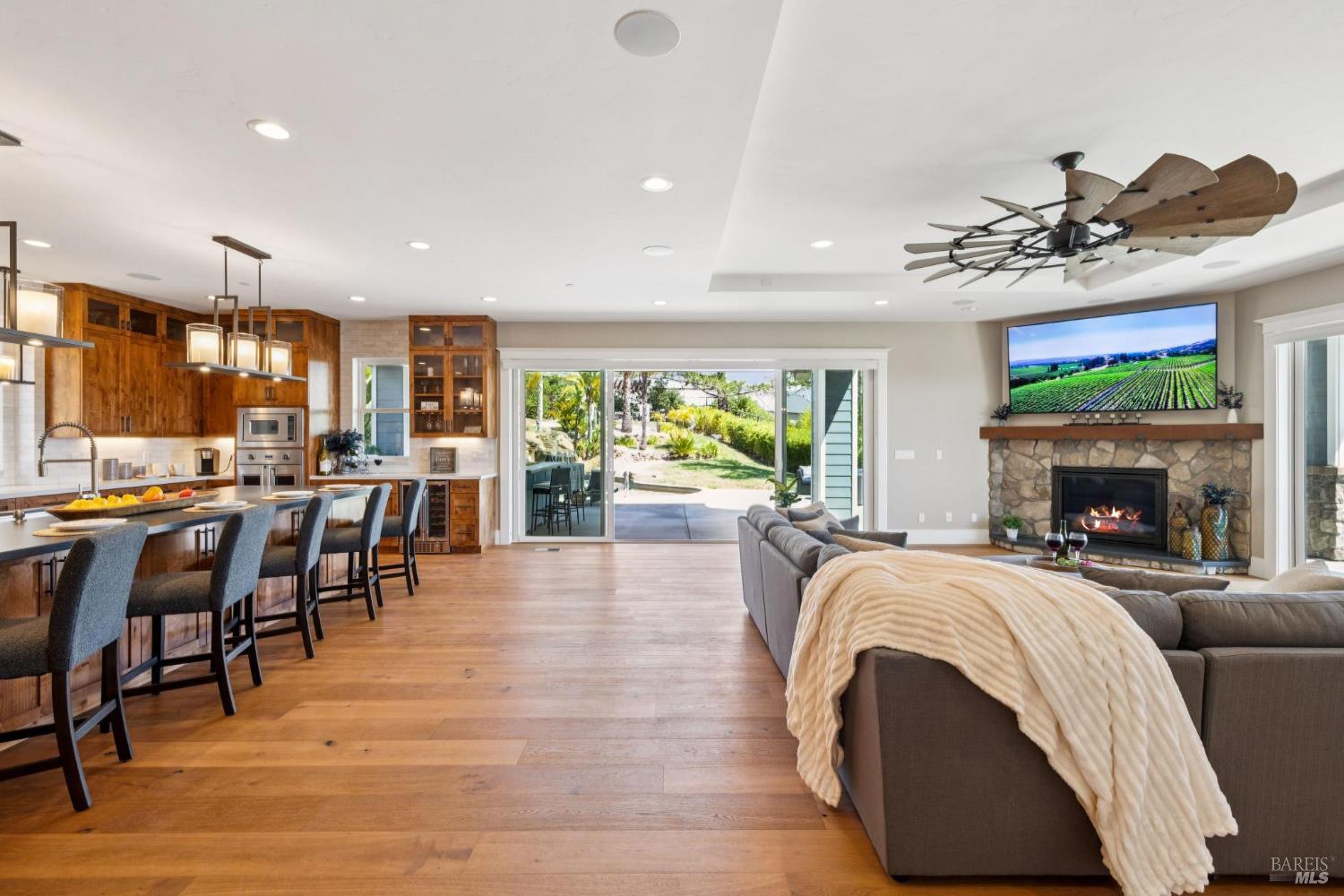 3882 Royal Manor Place Santa Rosa, CA 95404 - Photo 86 of 87 This open floor plan and easy outdoor access allows you to be connected to your friends and family while cooking meals in the kitchen.