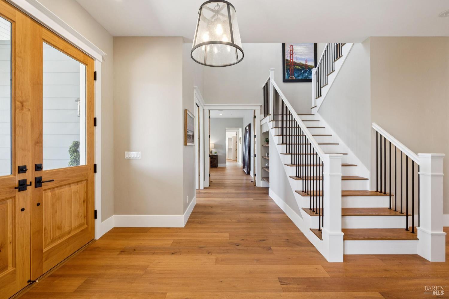 3882 Royal Manor Place Santa Rosa, CA 95404 - Photo 32 of 87 The large custom double doors with windows illuminate this elegant entry with natural light. The builder thoughtfully places recessed lighting as well as directional additional art lighting to illuminate your favorite art pieces.