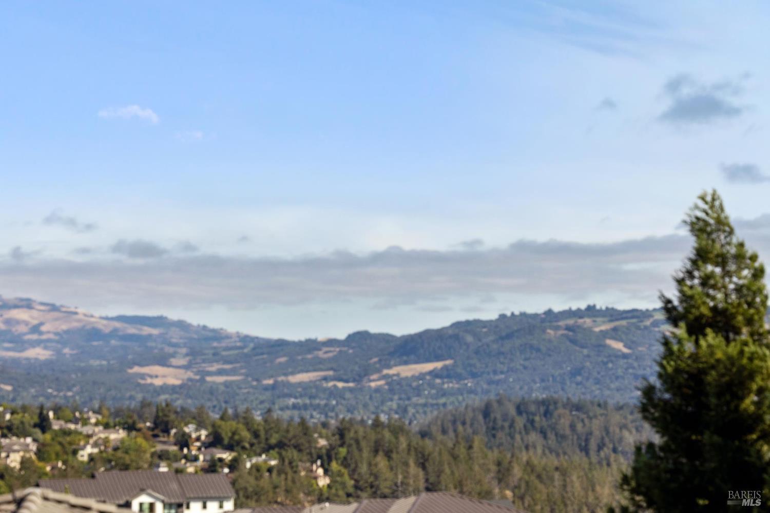3882 Royal Manor Place Santa Rosa, CA 95404 - Photo 46 of 87 This balcony on the second level with access from the loft and game/family room has amazing west facing views of Santa Rosa and the Sonoma Mountains. You can watch the fog gently roll over the hills into the valley from here.